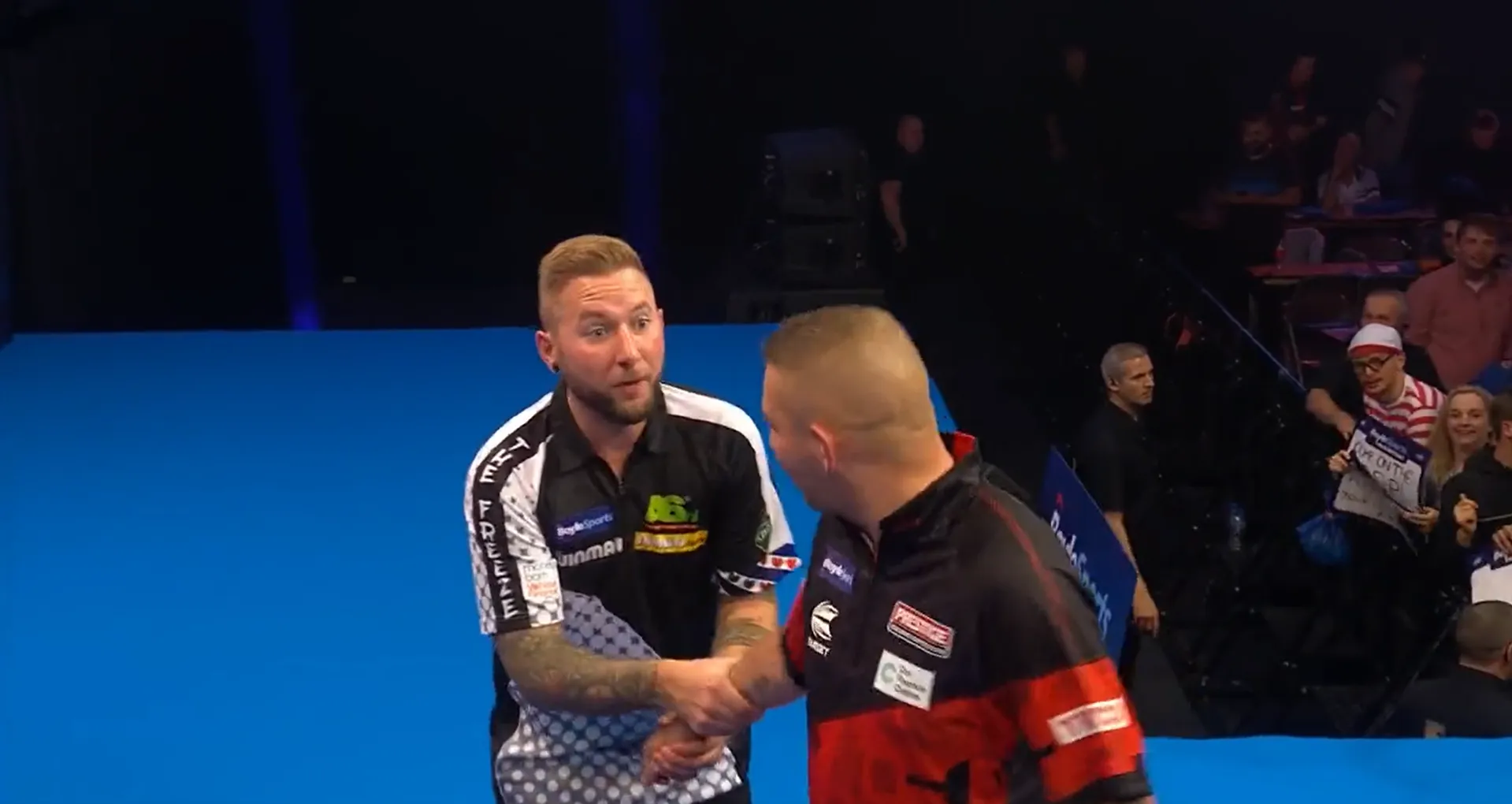 VIDEO: Words exchanged between Aspinall and Noppert after dramatic conclusion to World Grand Prix tie marred by crowd