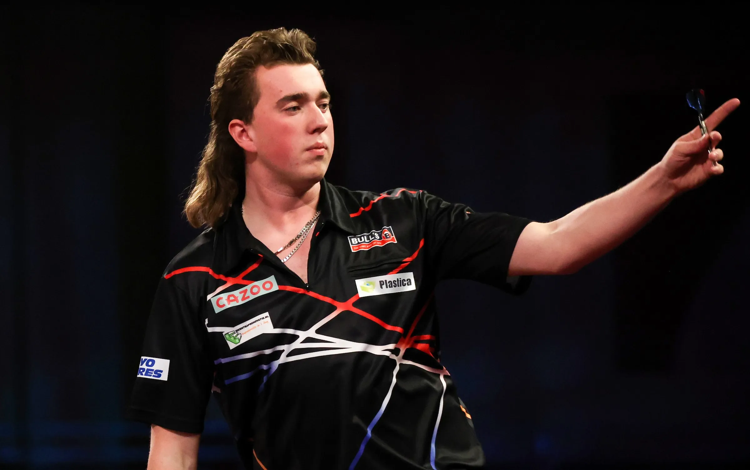 Jansen digs deep after Nebrida comeback to seal PDC World Darts Championship debut win