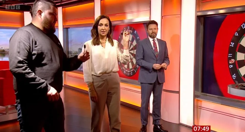 VIDEO: Michael Smith appears on BBC Breakfast, shows presenters how to throw darts