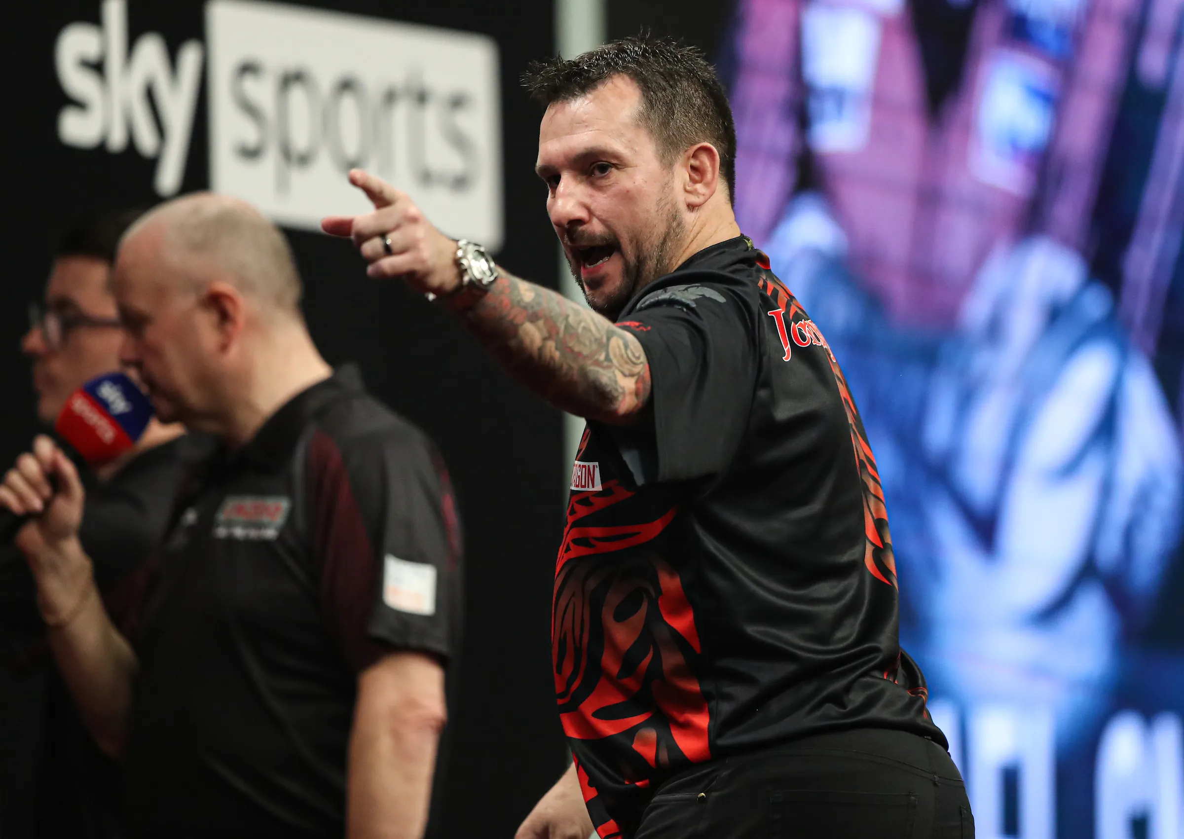 Clayton ends Curse of the Green Jacket, regains Austrian Darts Open with first European Tour title in five years