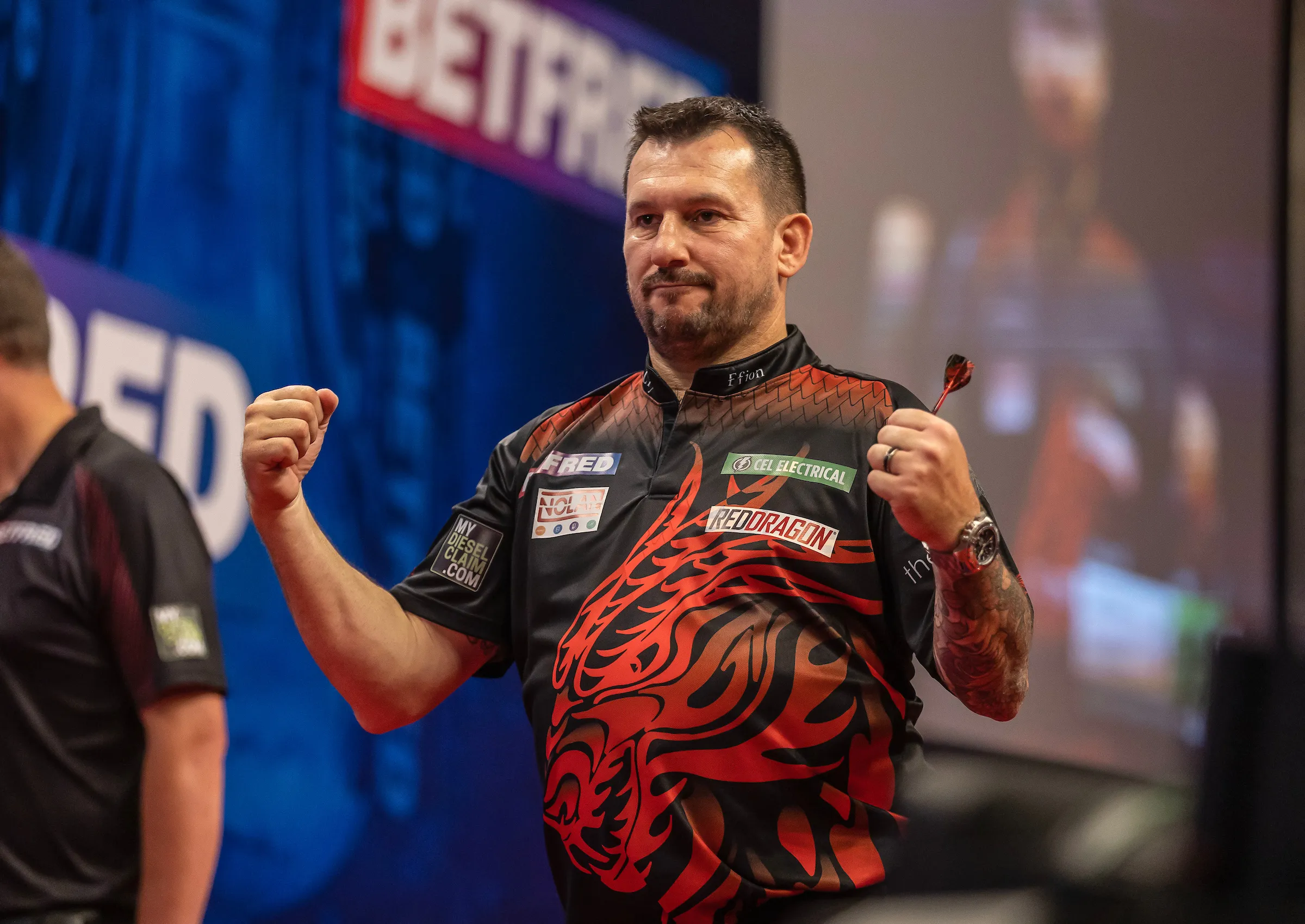 Classy Clayton eases past Van den Bergh in sensational display at World Matchplay