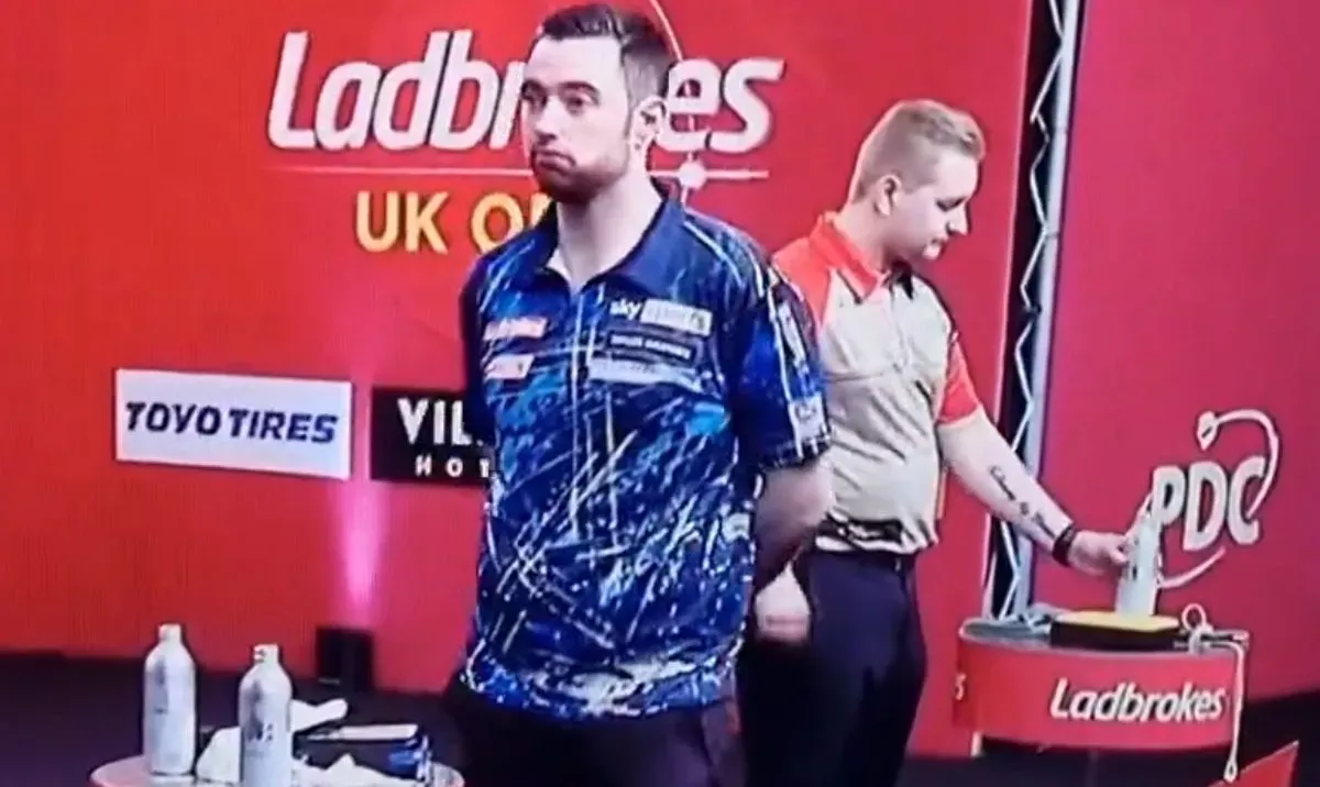 VIDEO: Crowd gets on Dimitri van den Bergh's back as the Belgian takes an age to settle himself in UK Open final