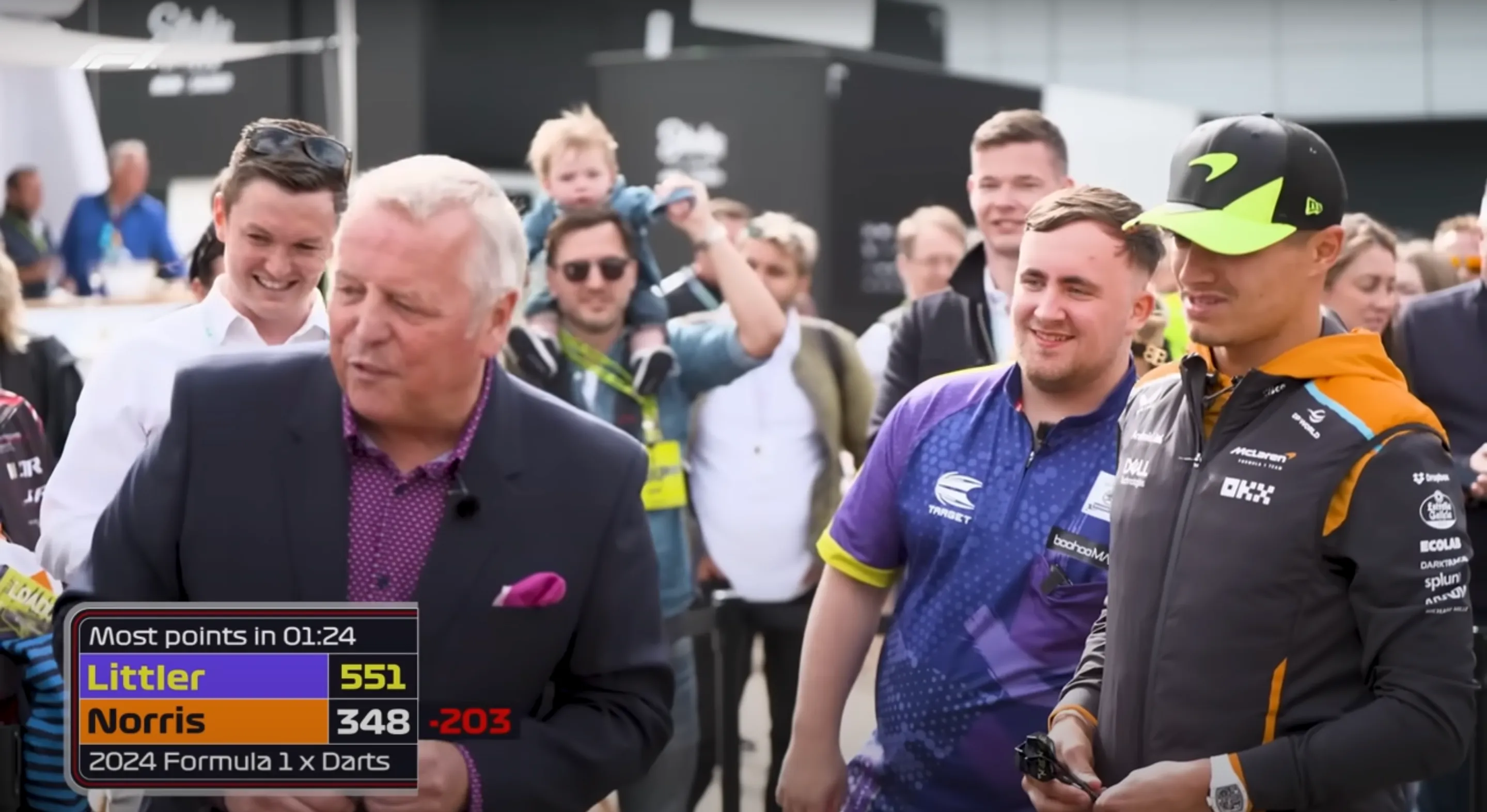 (VIDEO) Luke Littler challenges F1 grid to beat him at darts during British Grand Prix