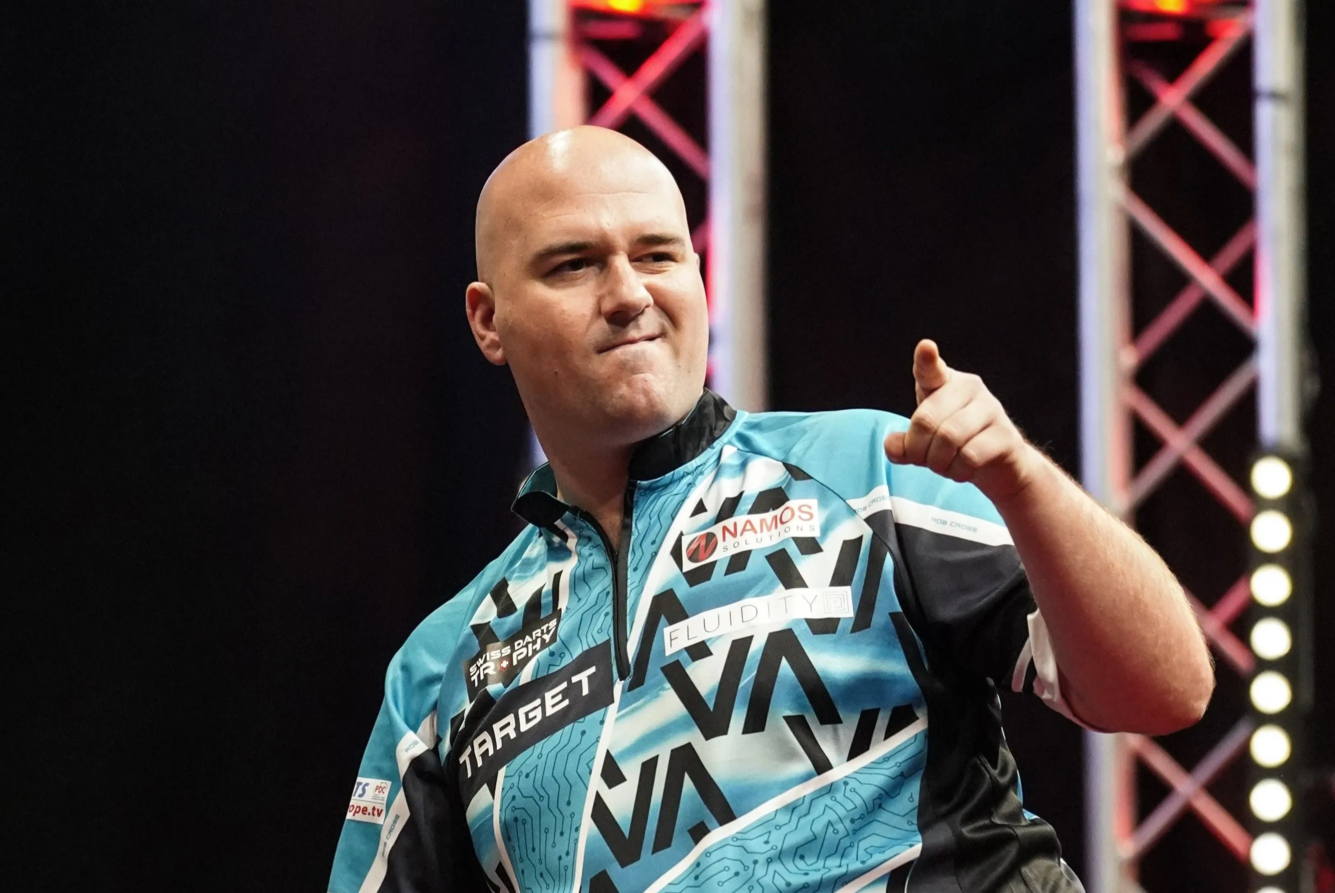 Vintage from Voltage as Rob Cross ends Luke Littler's World Grand Prix debut in the opening round