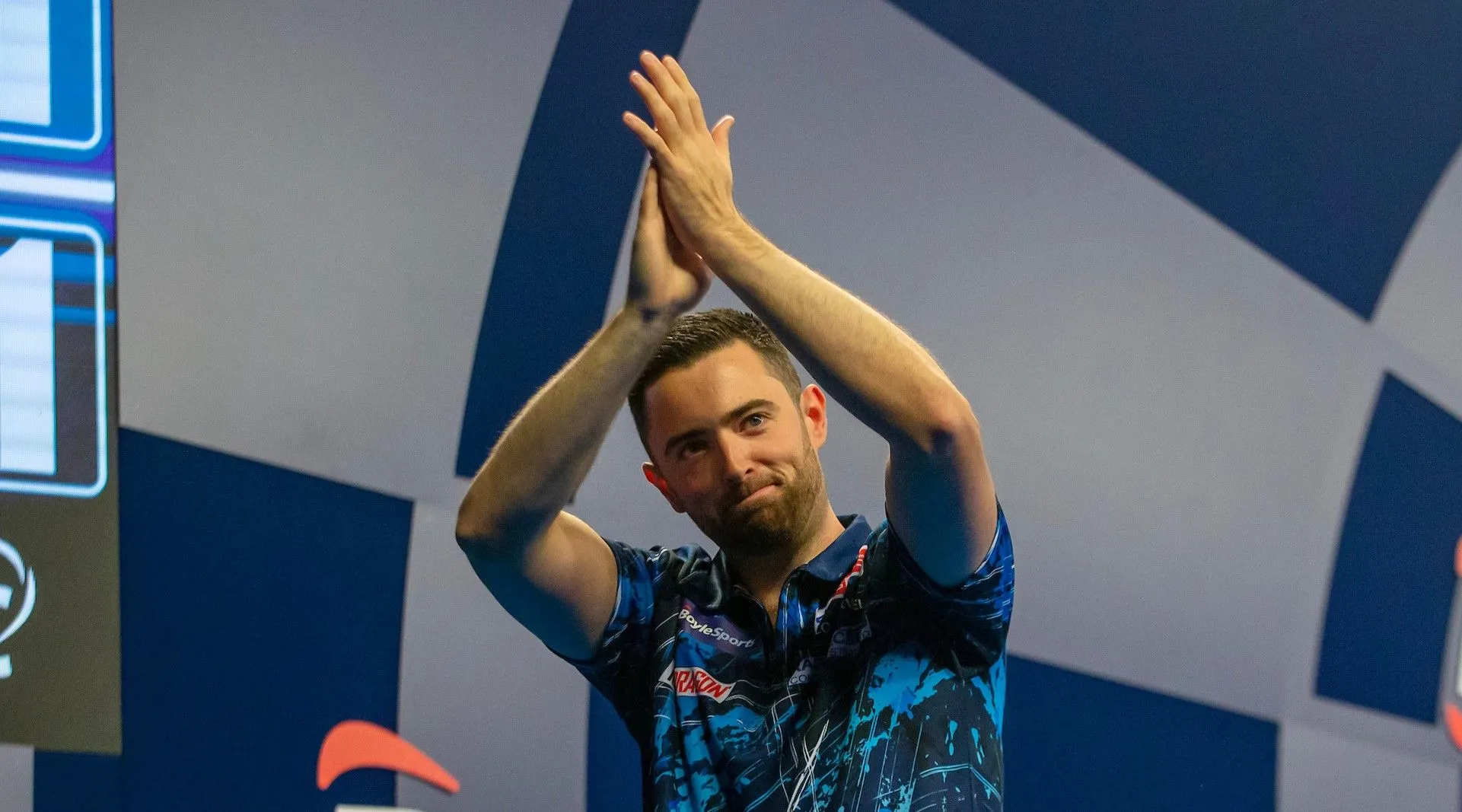 Luke Humphries fights past battling Ricardo Pietreczko to keep hopes of back to back World Grand Prix titles alive