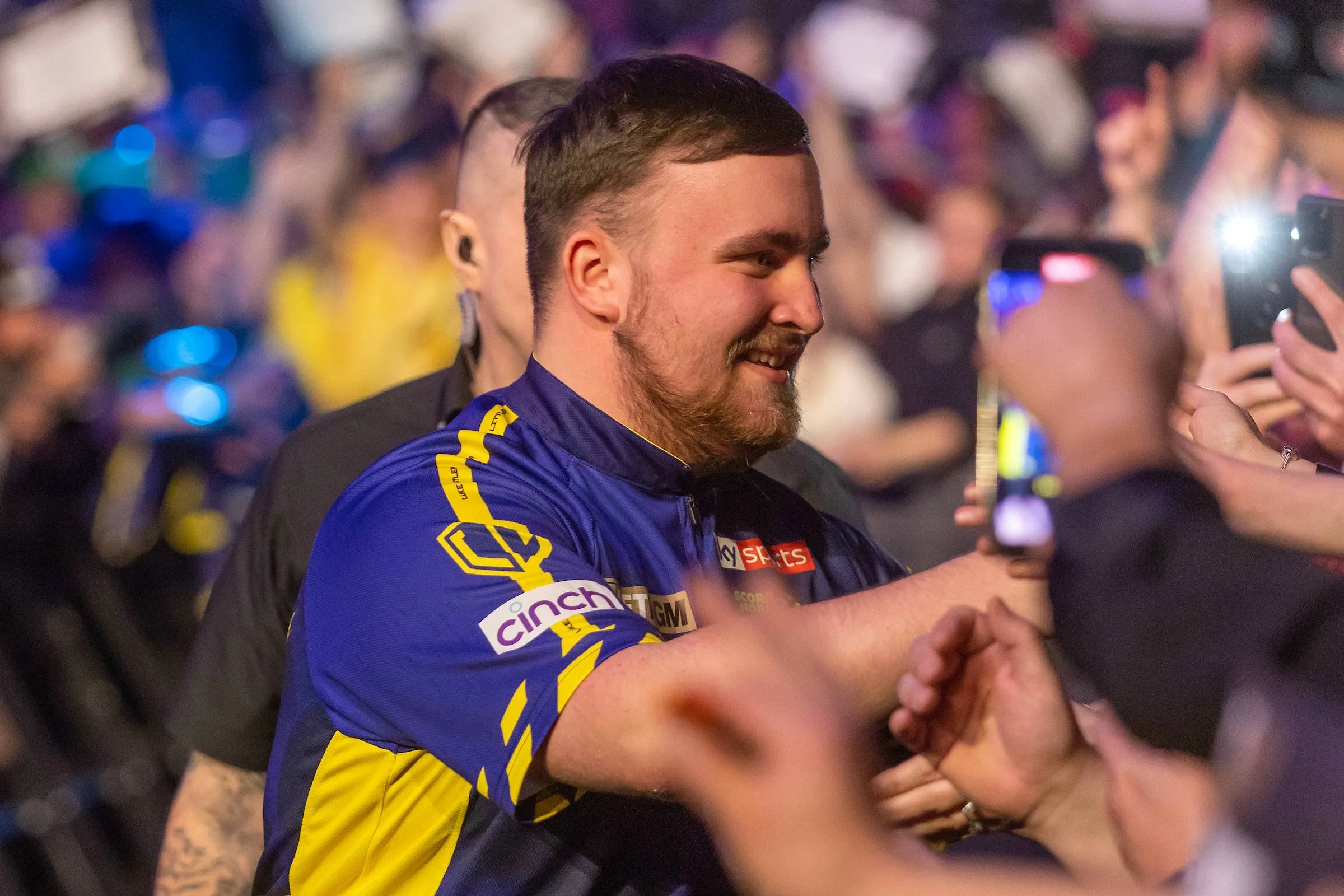 Luke Littler battles past brave Krzysztof Ratajski to reach quarter-finals at 2025 UK Open