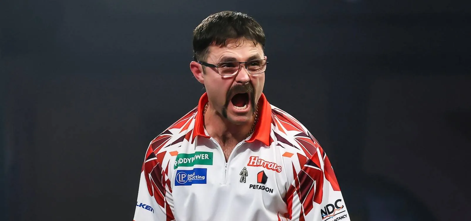 Damon Heta letting out a huge cheer on stage