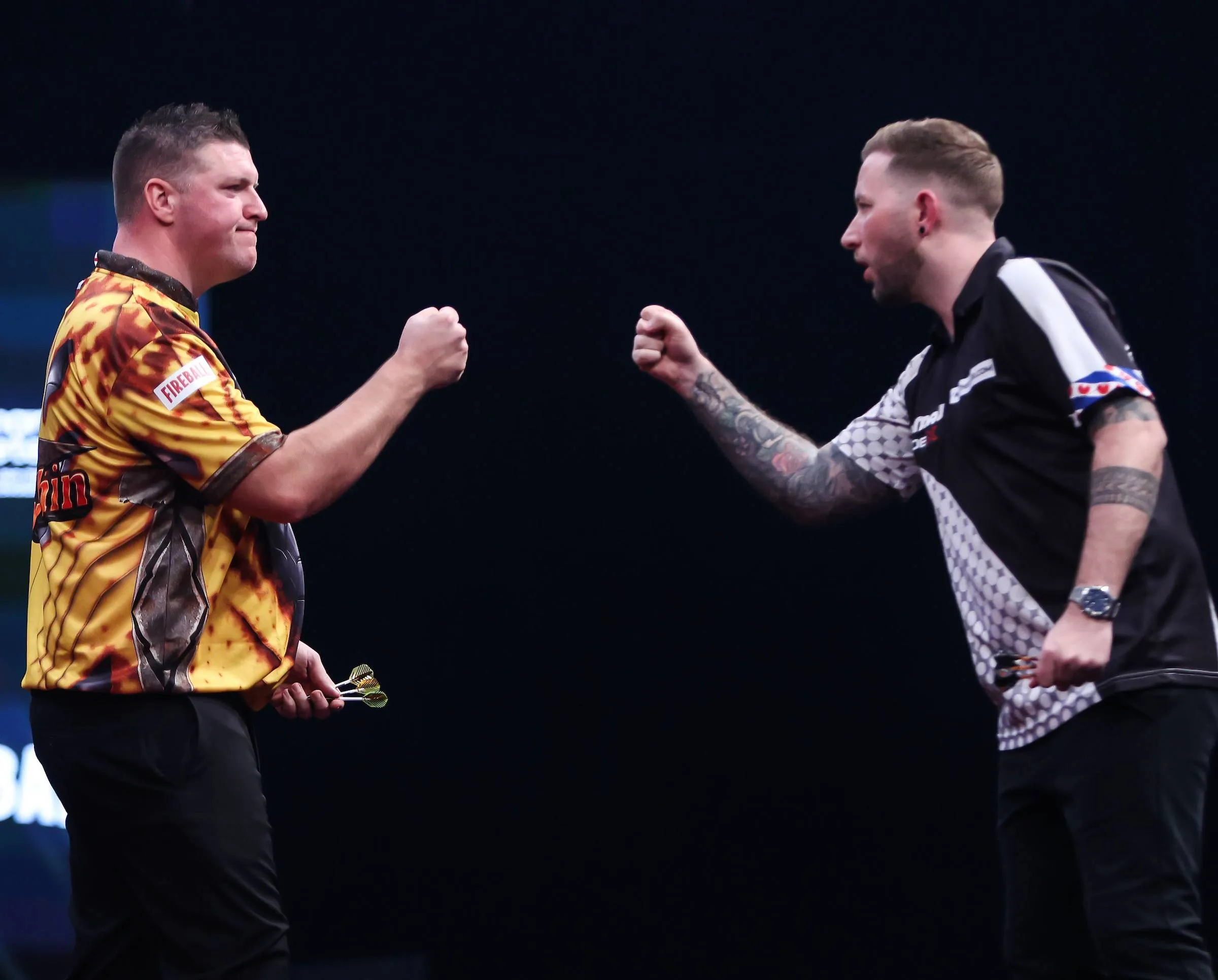 Daryl Gurney and Danny Noppert fist-bump ahead of their Winmau World Masters match