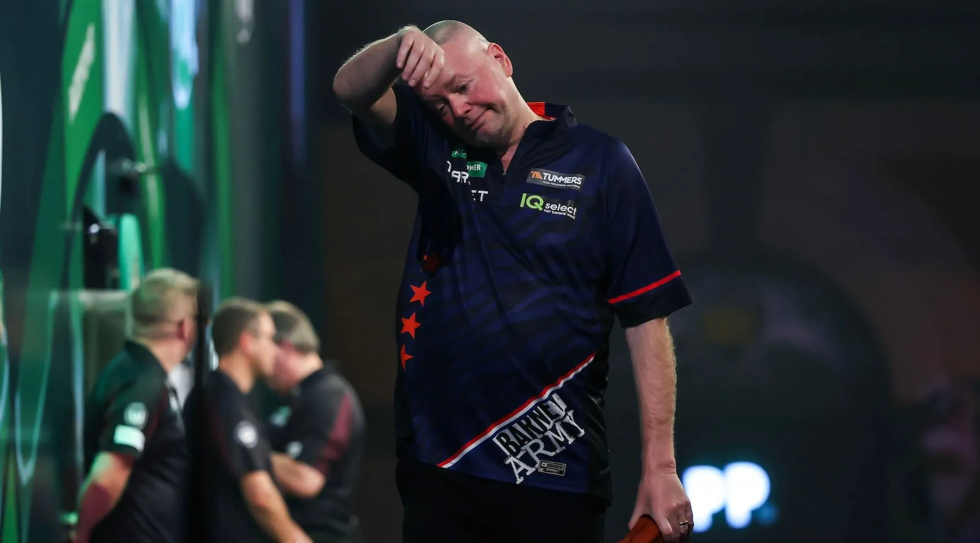 Raymond van Barneveld walks off the Ally Pally stage