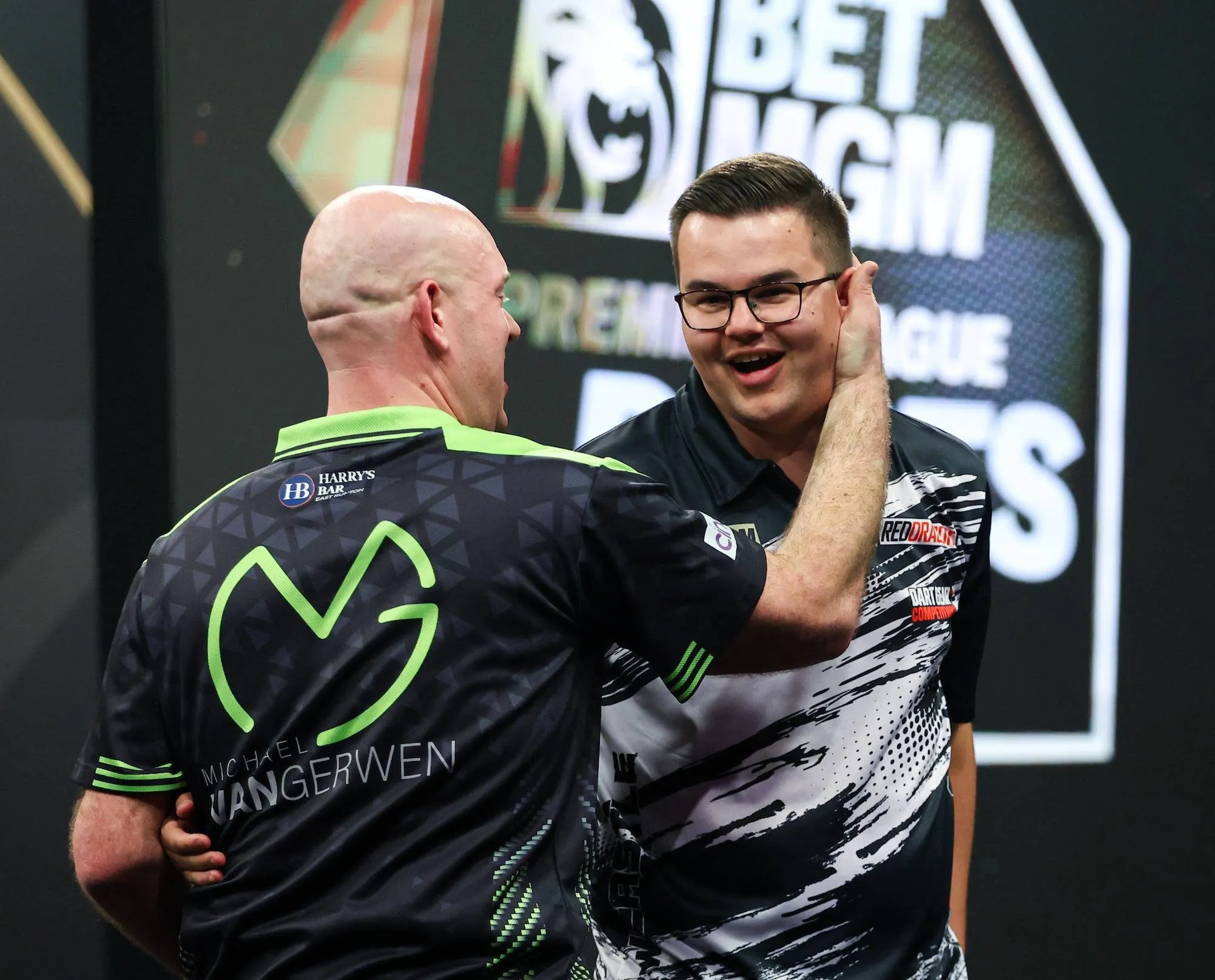 Michael van Gerwen and Gian van Veen after their match on night one of the 2026 Premier League Darts in Newcastle