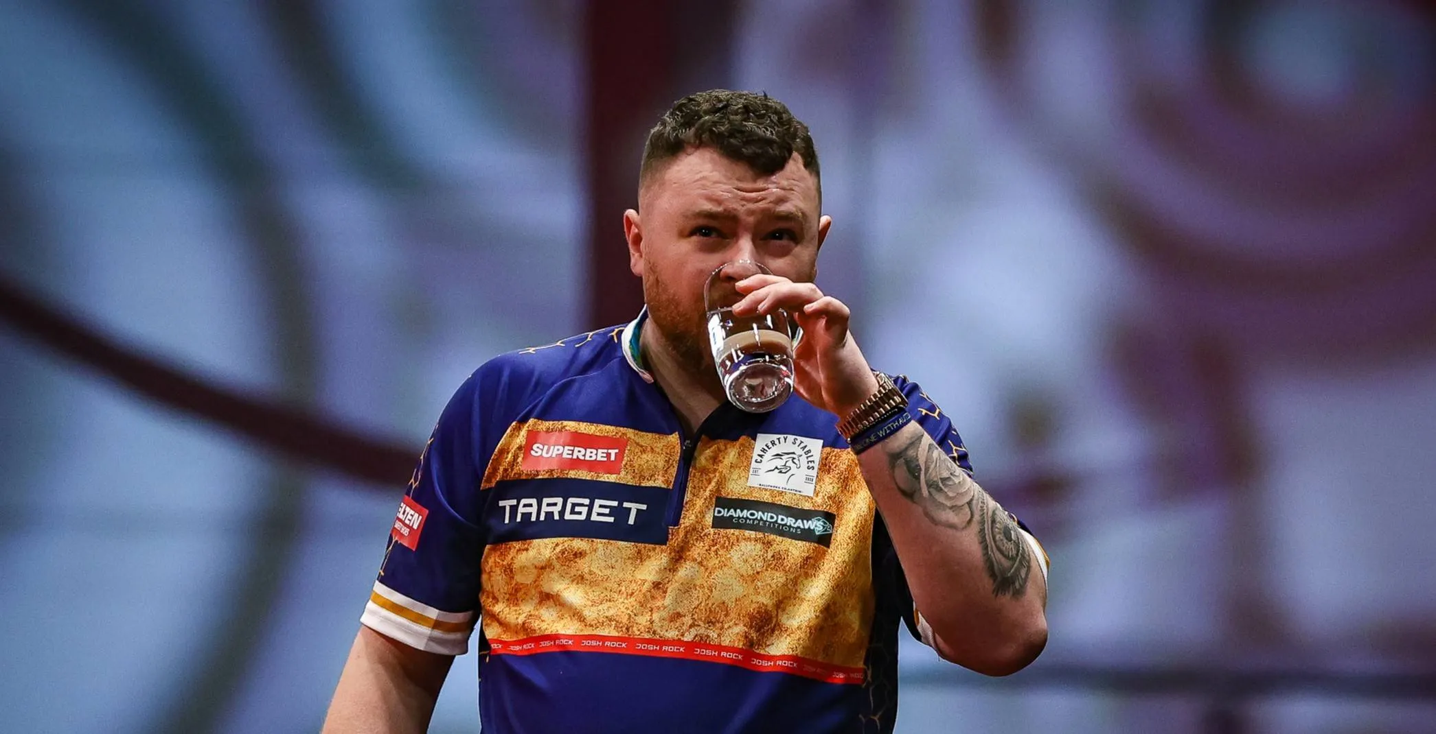 Josh Rock takes a sip of water.