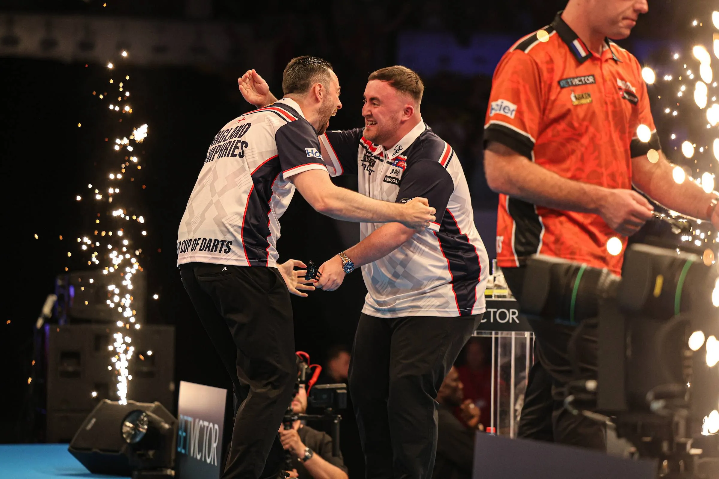 Luke Littler and Luke Humphries celebrating winning the 2026 World Cup of Darts for England