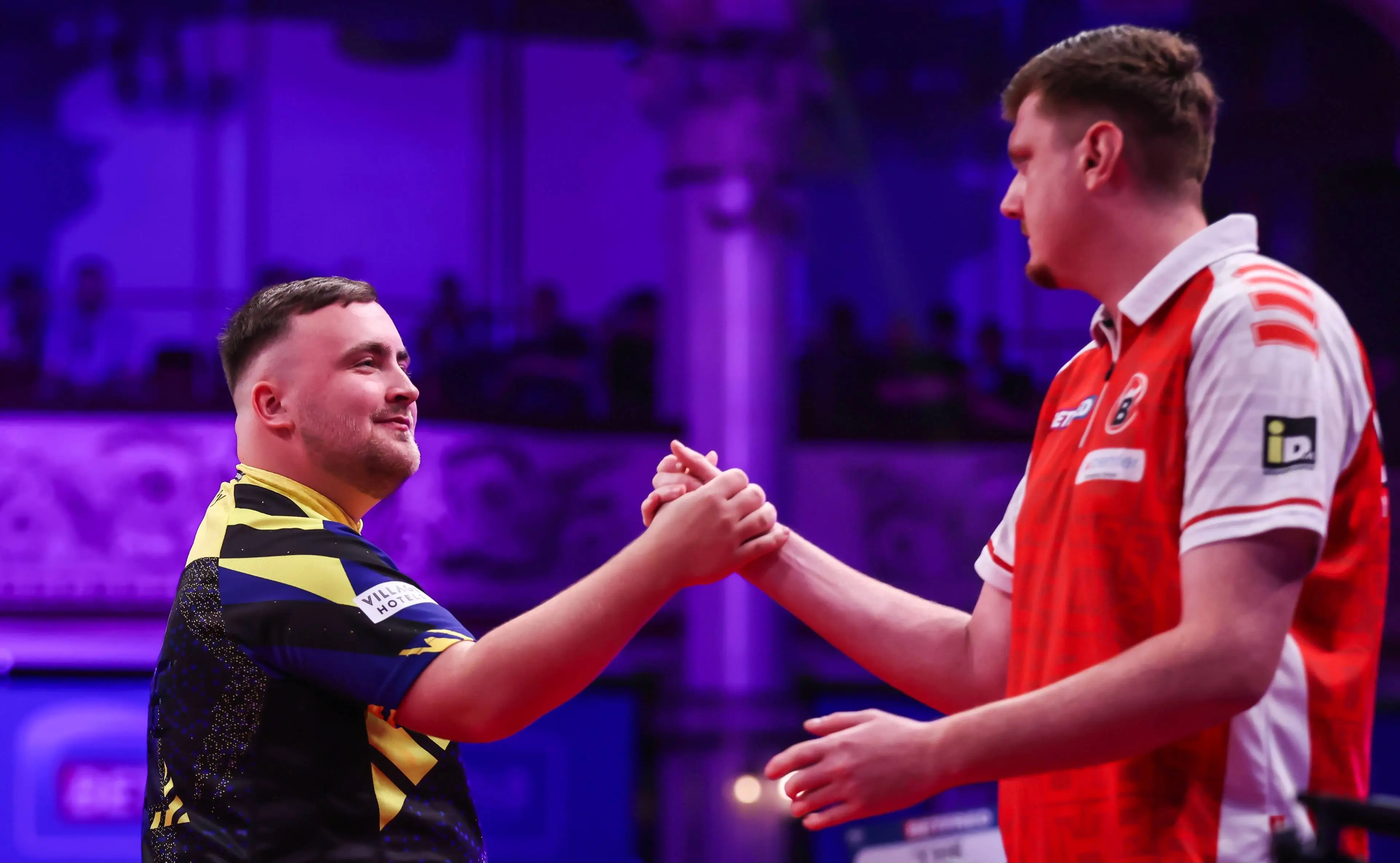 Luke Littler and Niko Springer shake hands at the 2026 World Matchplay