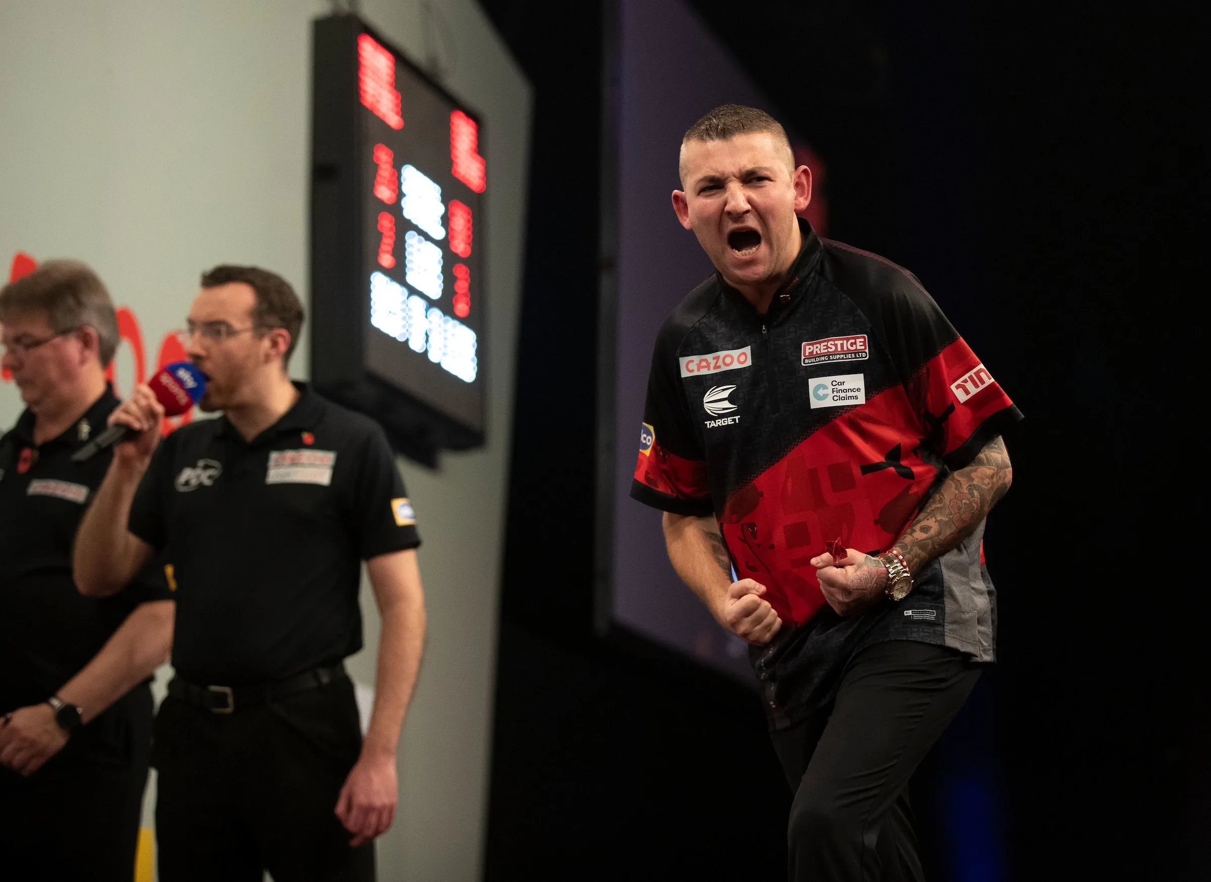 Aspinall kickt Wright aus dem Grand Slam of Darts