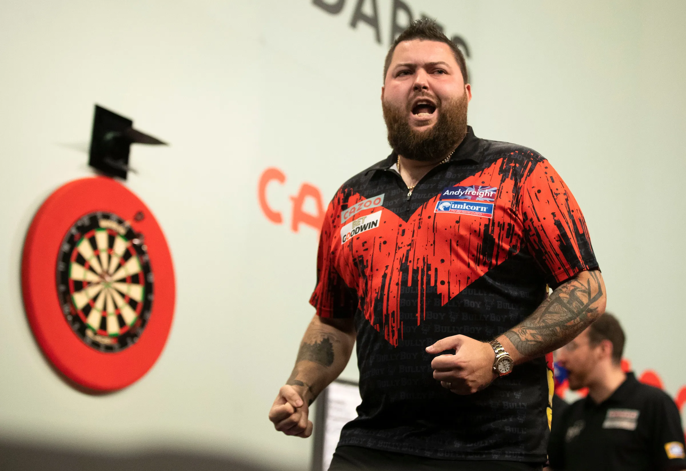 Michael Smith grijpt na acht verloren finales eindelijk zijn eerste major-titel op Grand Slam of Darts