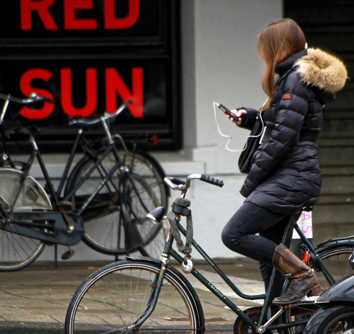 girl bike bicycle iphone music earphones texting mobile phone 856329jpgd