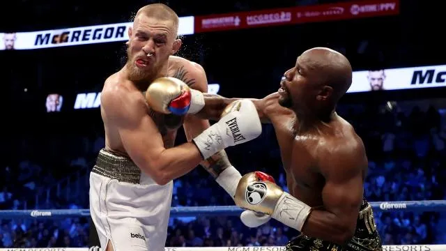 bokser mayweather wint money fight van kooivechter mcgregor