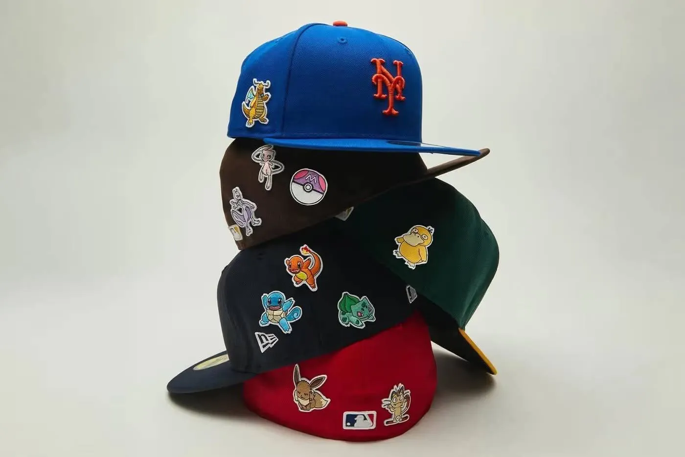 https___hypebeast.com_image_2026_05_06_new-era-korea-caps-pokemon-custom-collection-snapps-heat-seal-patches-pikachu-charizard-gengar-mewtwo-release-info-001