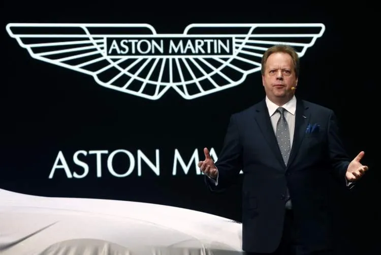 aston martin ceo andrew palmer addresses the media during the 85th international motor show in geneva march 3 2015