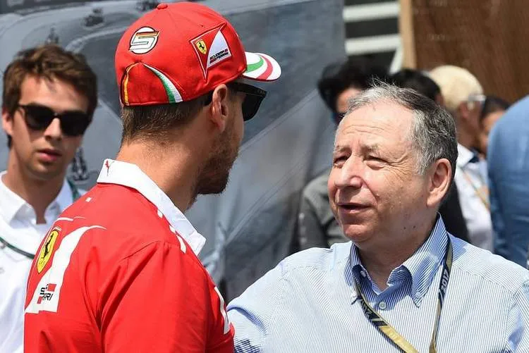 jean todt r im gespraech mit ferrari pilot sebastian vettel 001