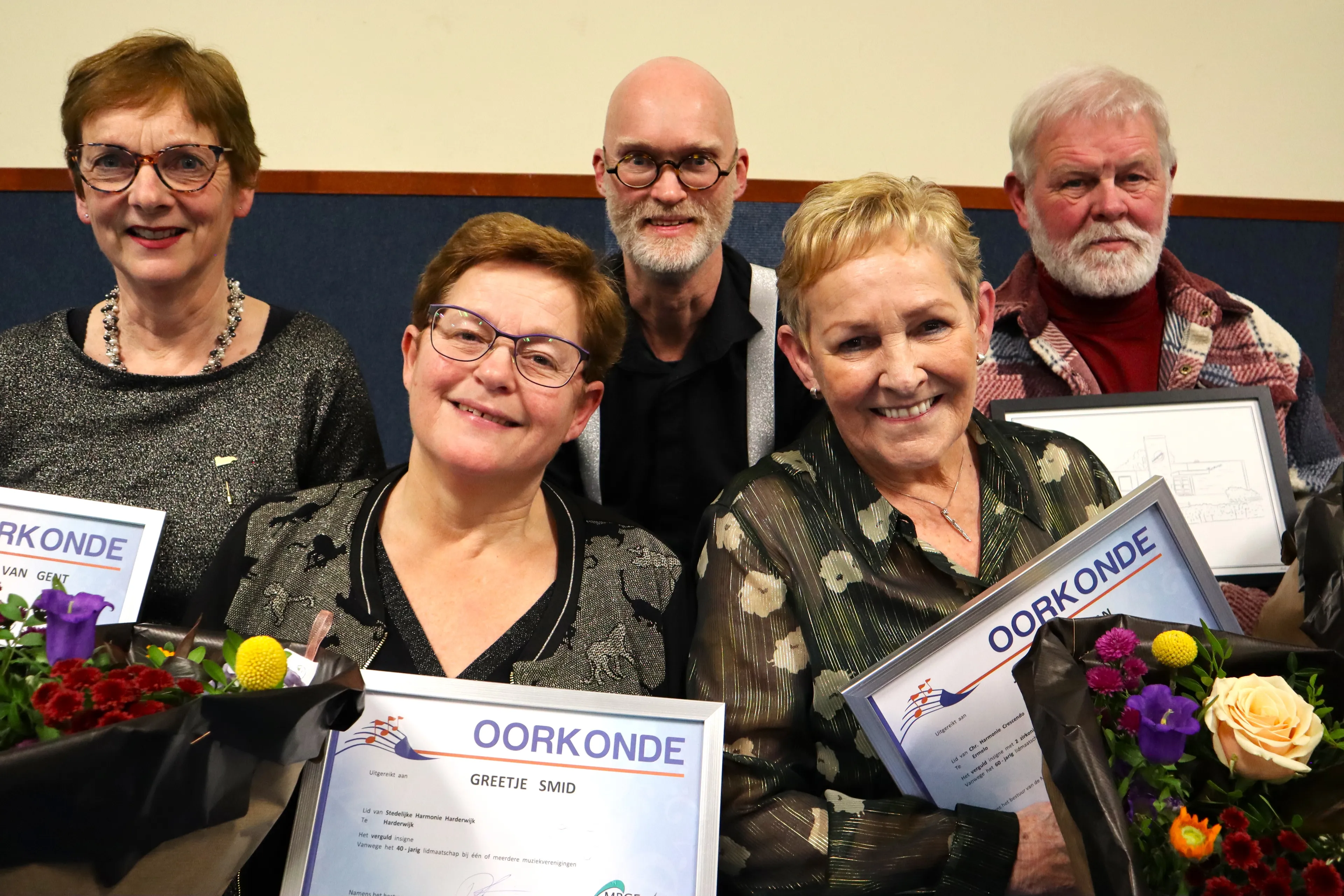 Jubilarissen Regioharmonie De Verbinding gehuldigd