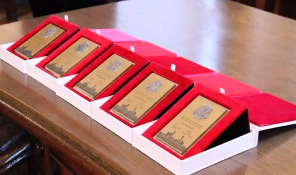 premijos