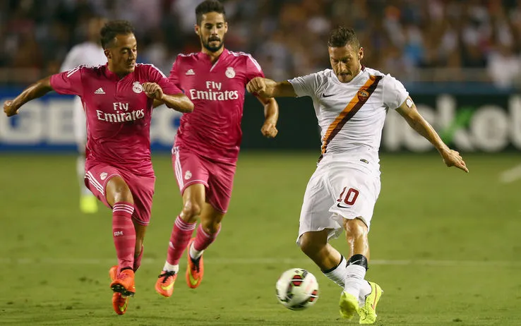 totti porta palla real madrid roma