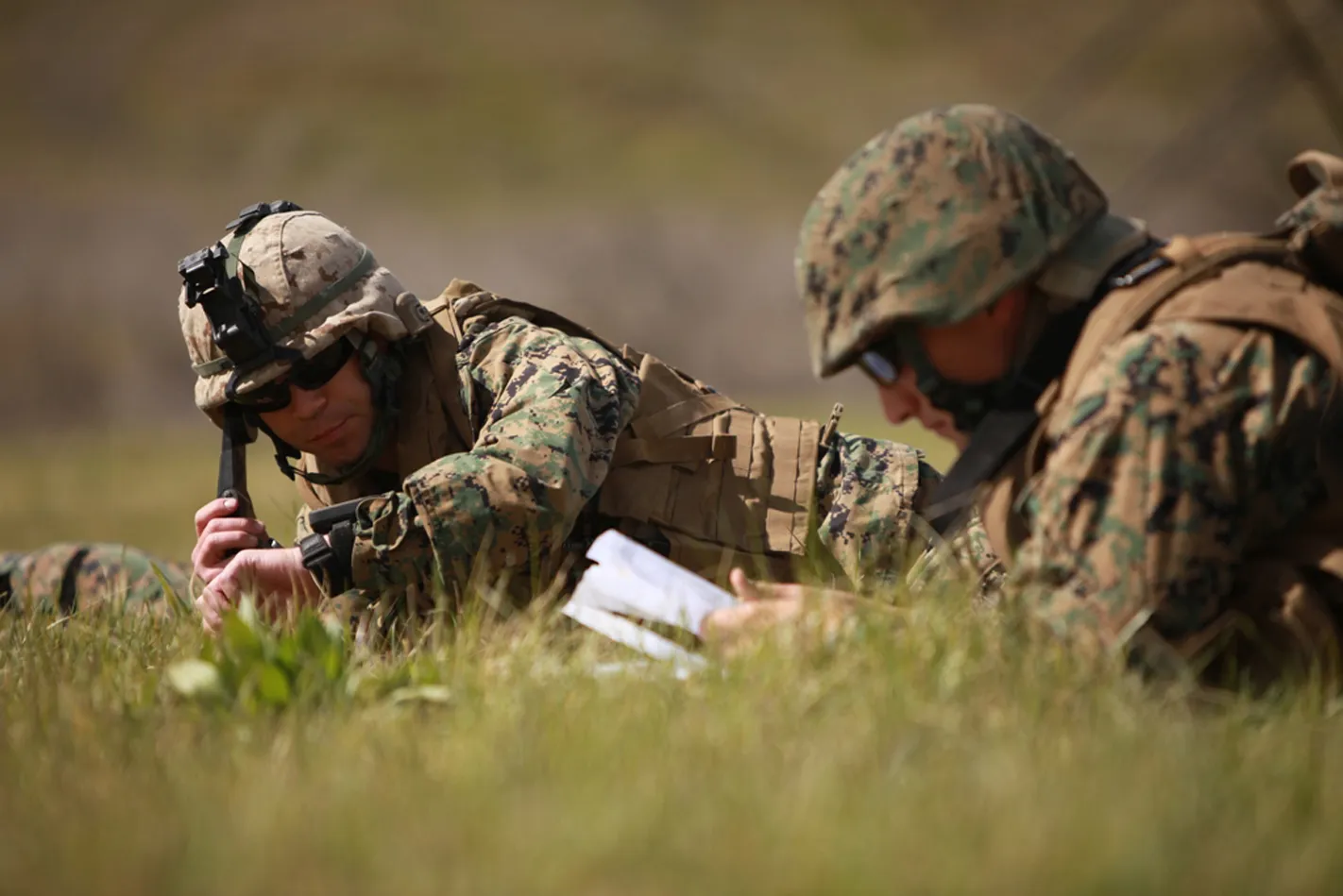 defensegov news photo 110228 m bt412 287 capt christopher robb the forward air controller with 1st tank battalion quick reaction force calls in their position to their higher