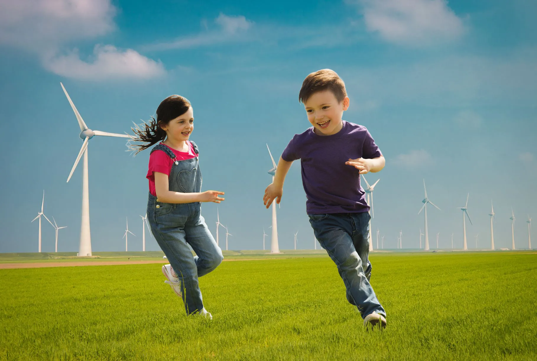windmolenpark met spelende kinderen
