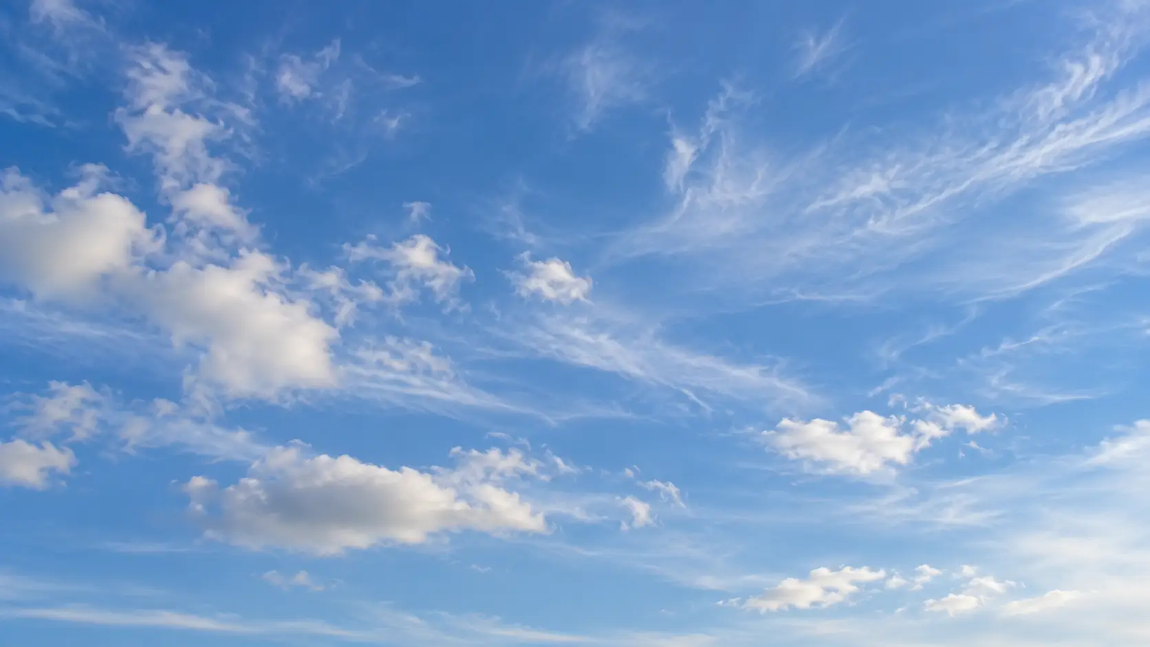 Blauwe lucht met enkele witte wolken, AI-illustratie voor Nunspeet Nieuws