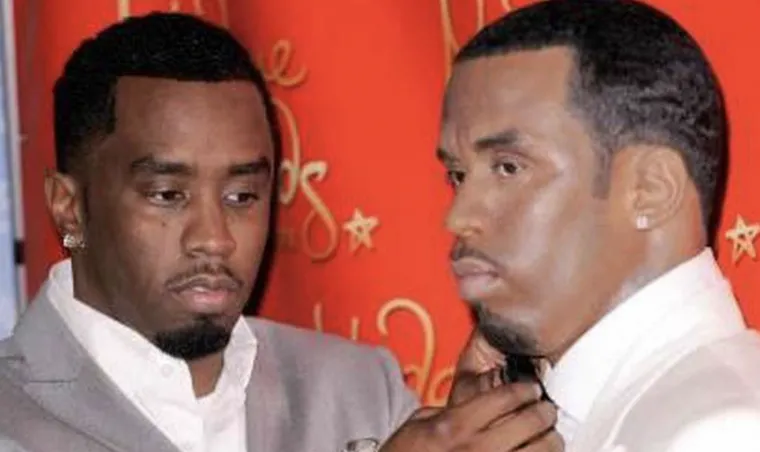 Man onthoofdt beeld van P. Diddy en slaat op de vlucht