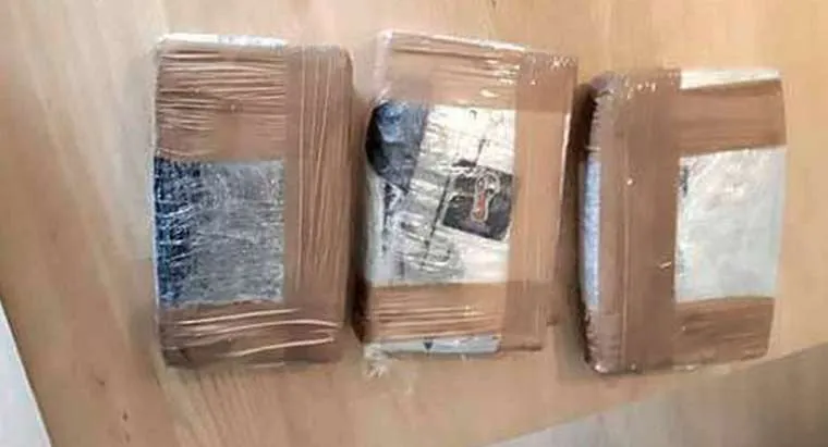 Politie vindt 15 kilo cocaïne en vuurwapens aan de grachtengordel