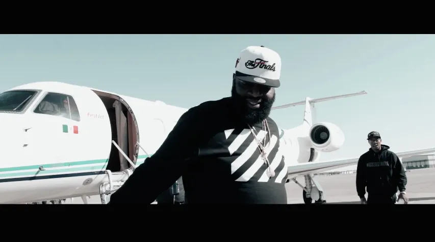 rick ross flies private jet big baller maybach