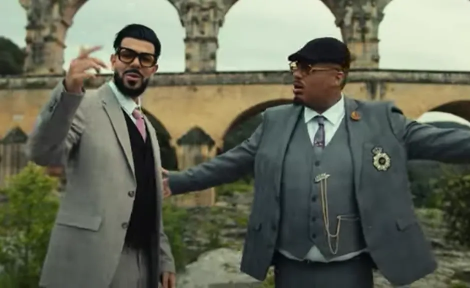 DYSTINCT strak in pak voor 'Business' video met Franse rapper Naza