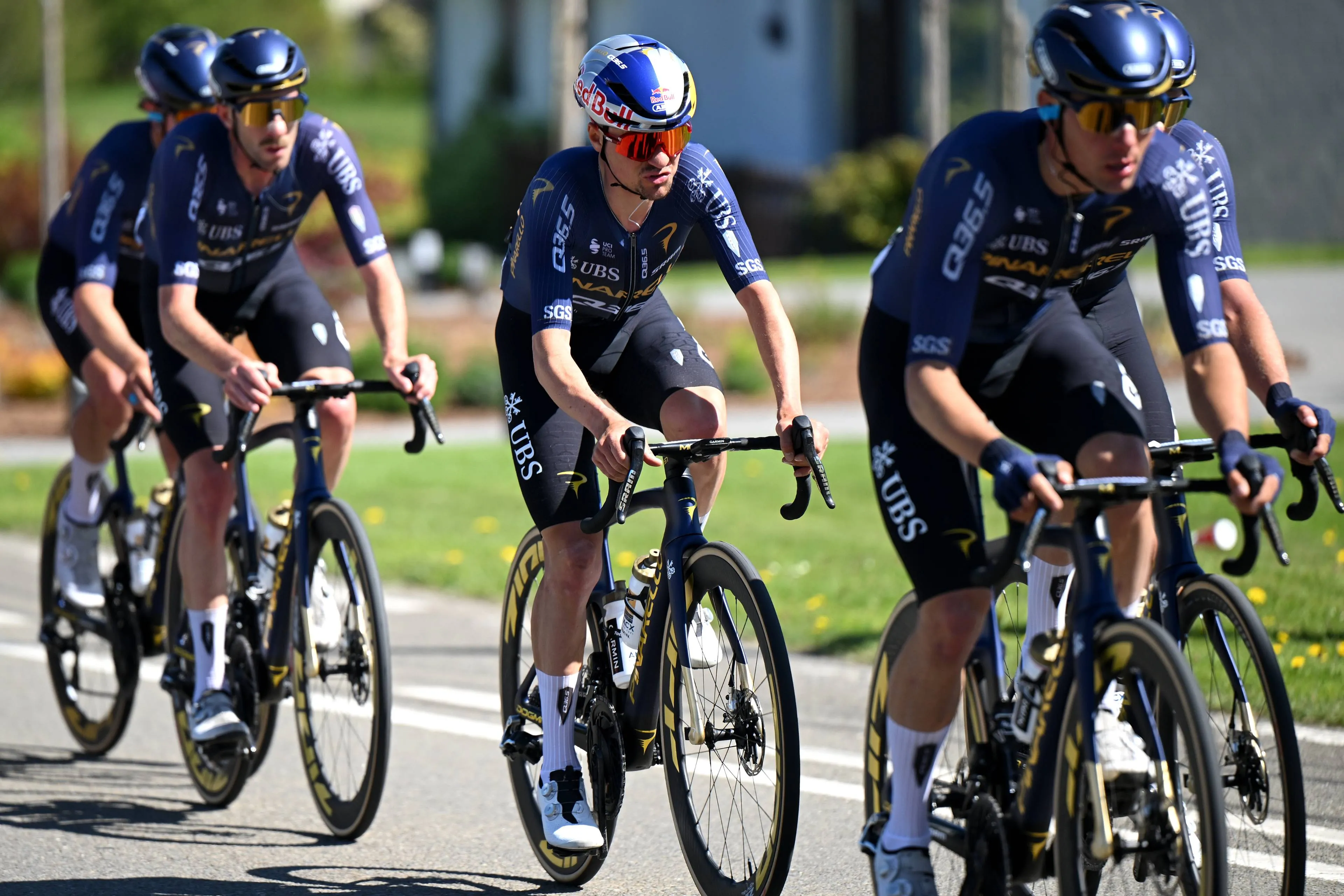 Tom Pidcock surrounded by Q36.5 teammates at Liege-Bastogne-Liege 2026