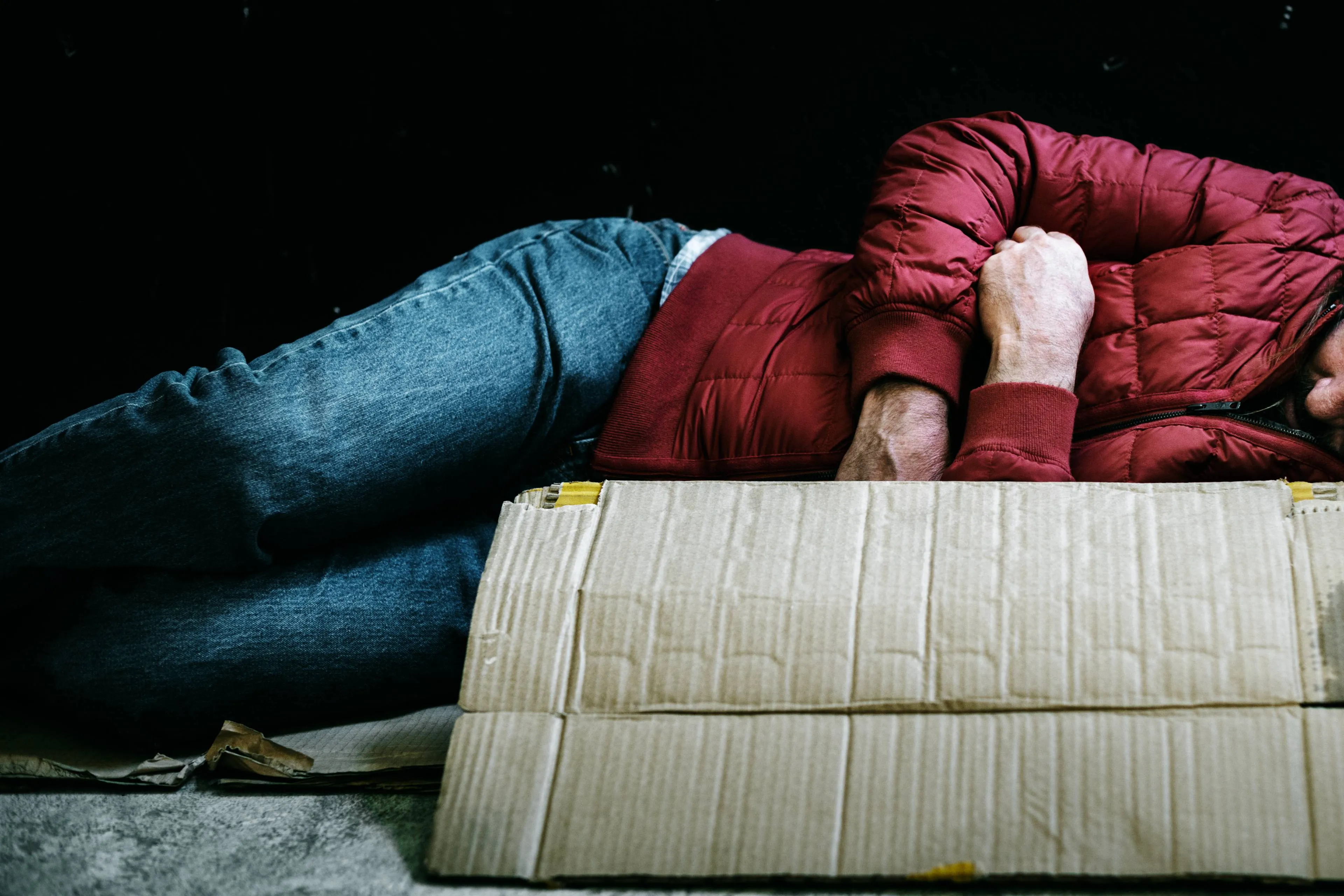 homeless-man-sleeping-out-cold