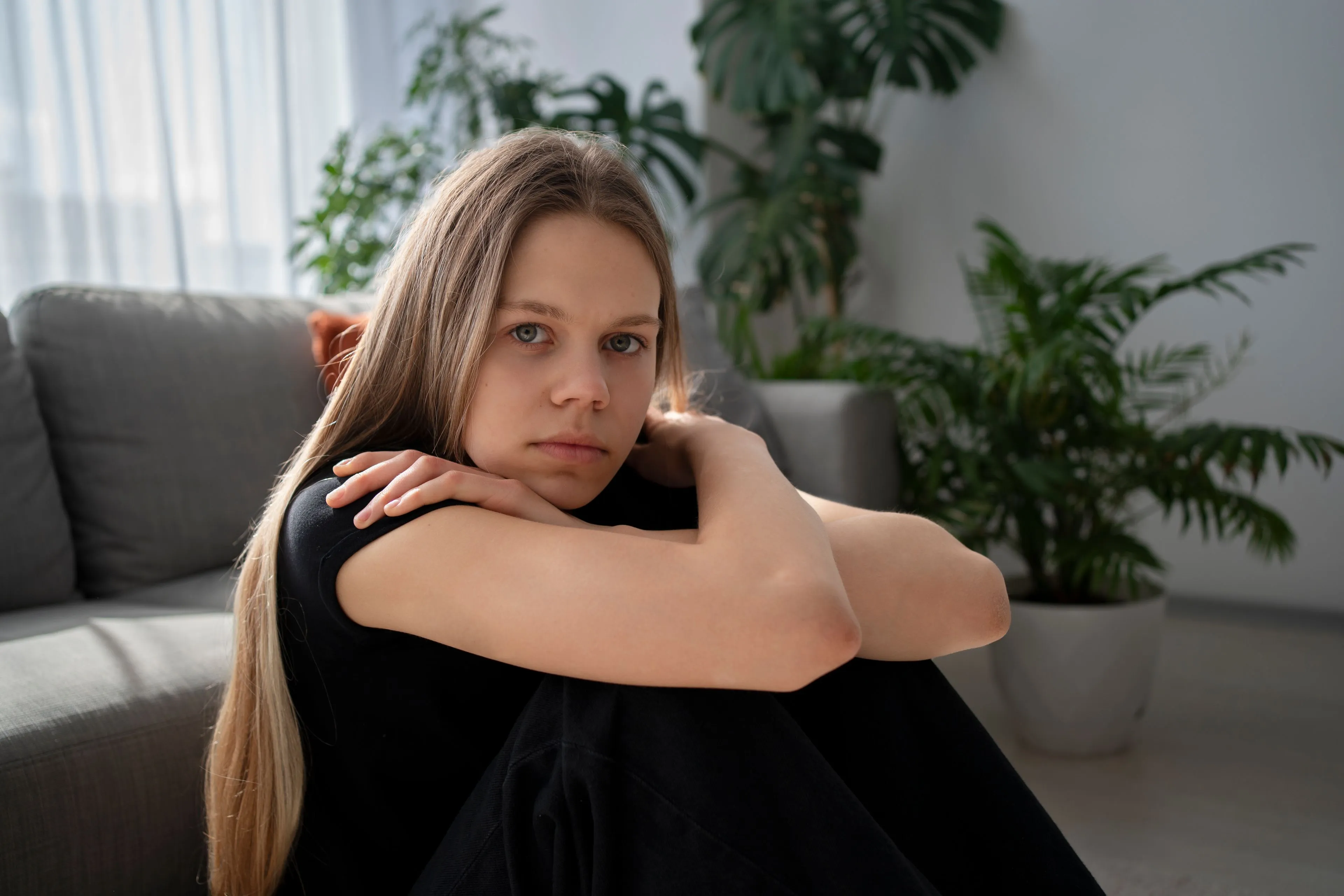 sad young woman home