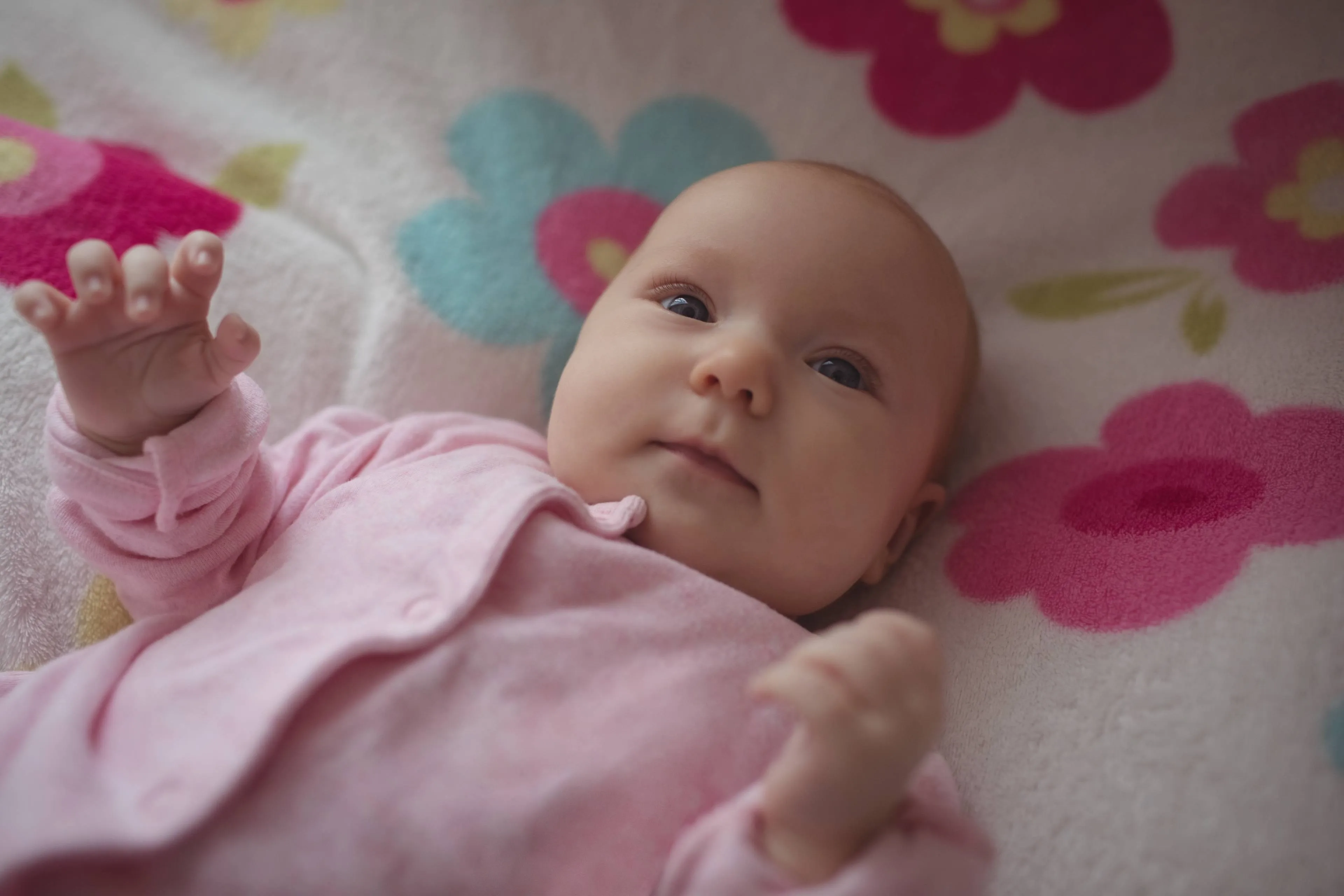 cute baby lying bed home