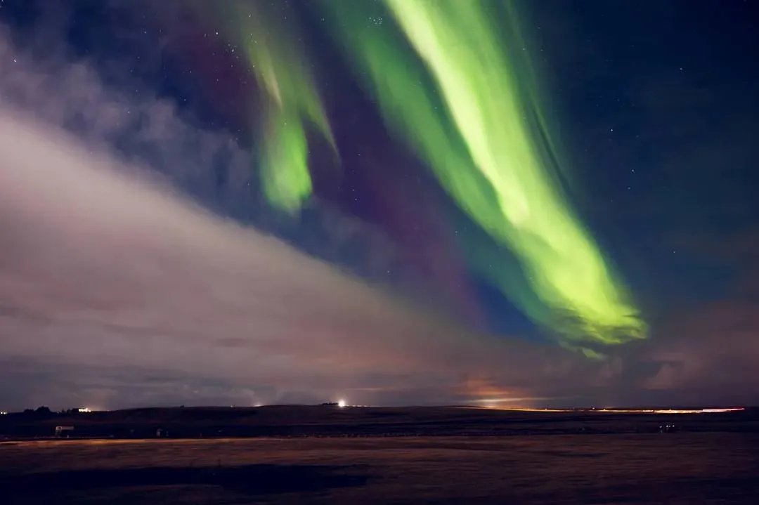 beautiful-aurora-borealis-sky-iceland-spectacular-green-violet-northern-lights-appearing-night-creating-panoramic-landscape-glowing-magical-natural-phenomenon-starry-sky-67e057b0840b0