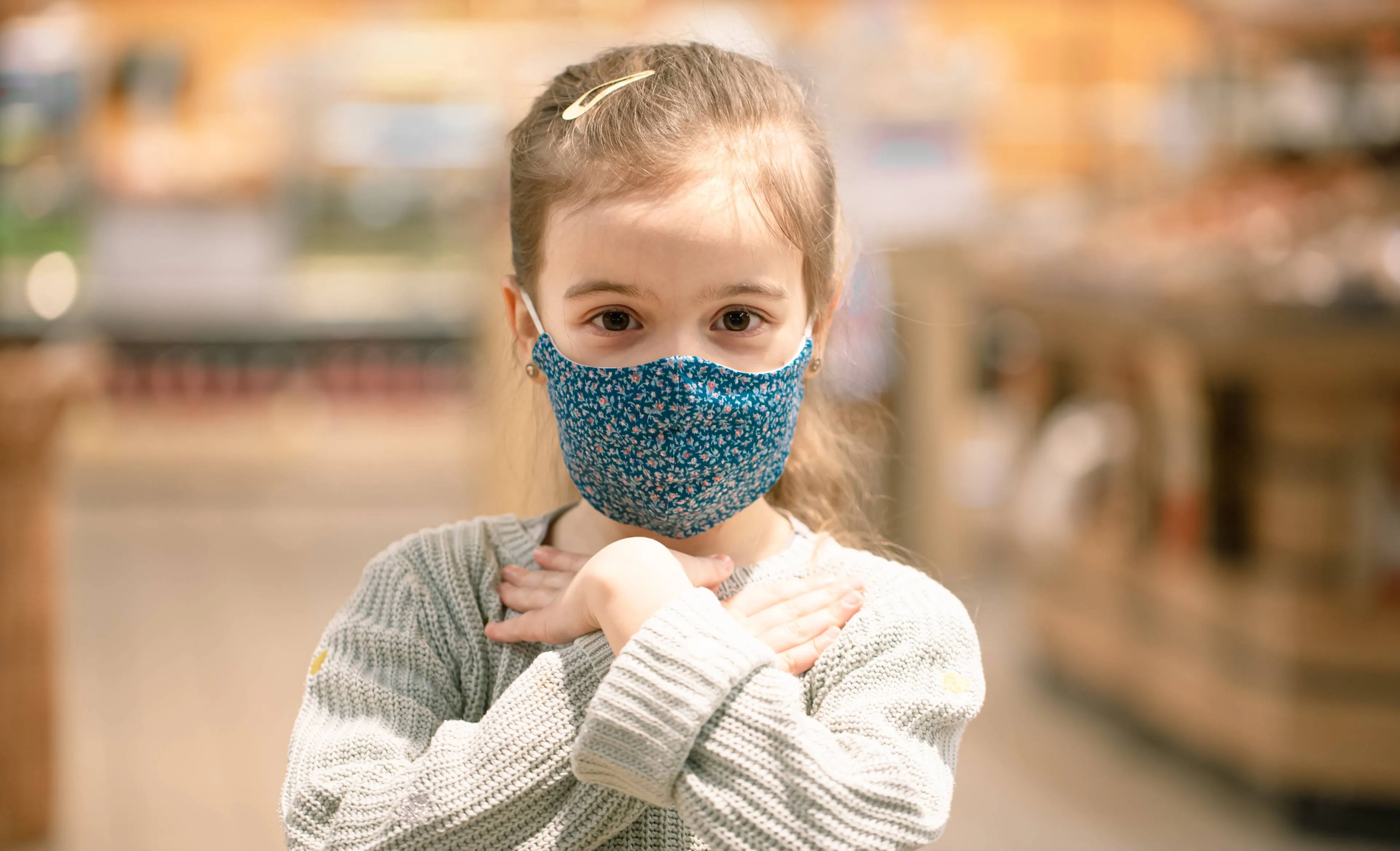 portrait-child-wearing-reusable-mask-supermarket-covid-pandemic