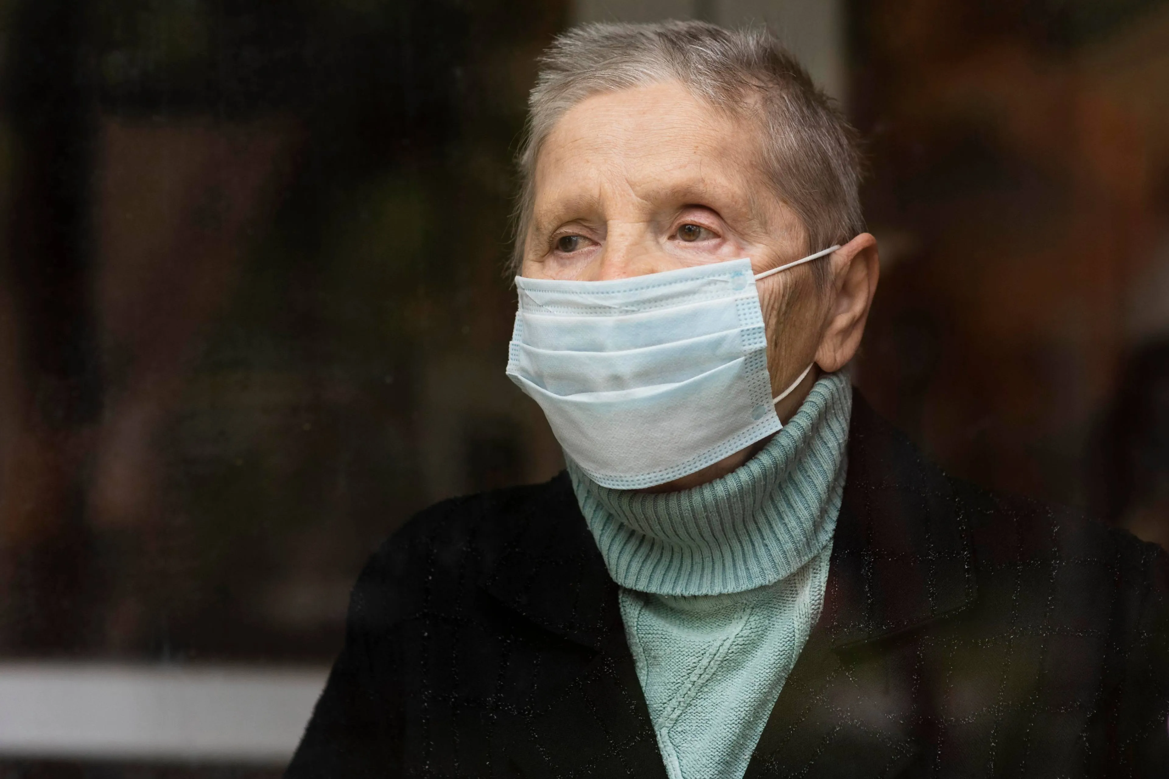portrait-older-woman-with-medical-mask