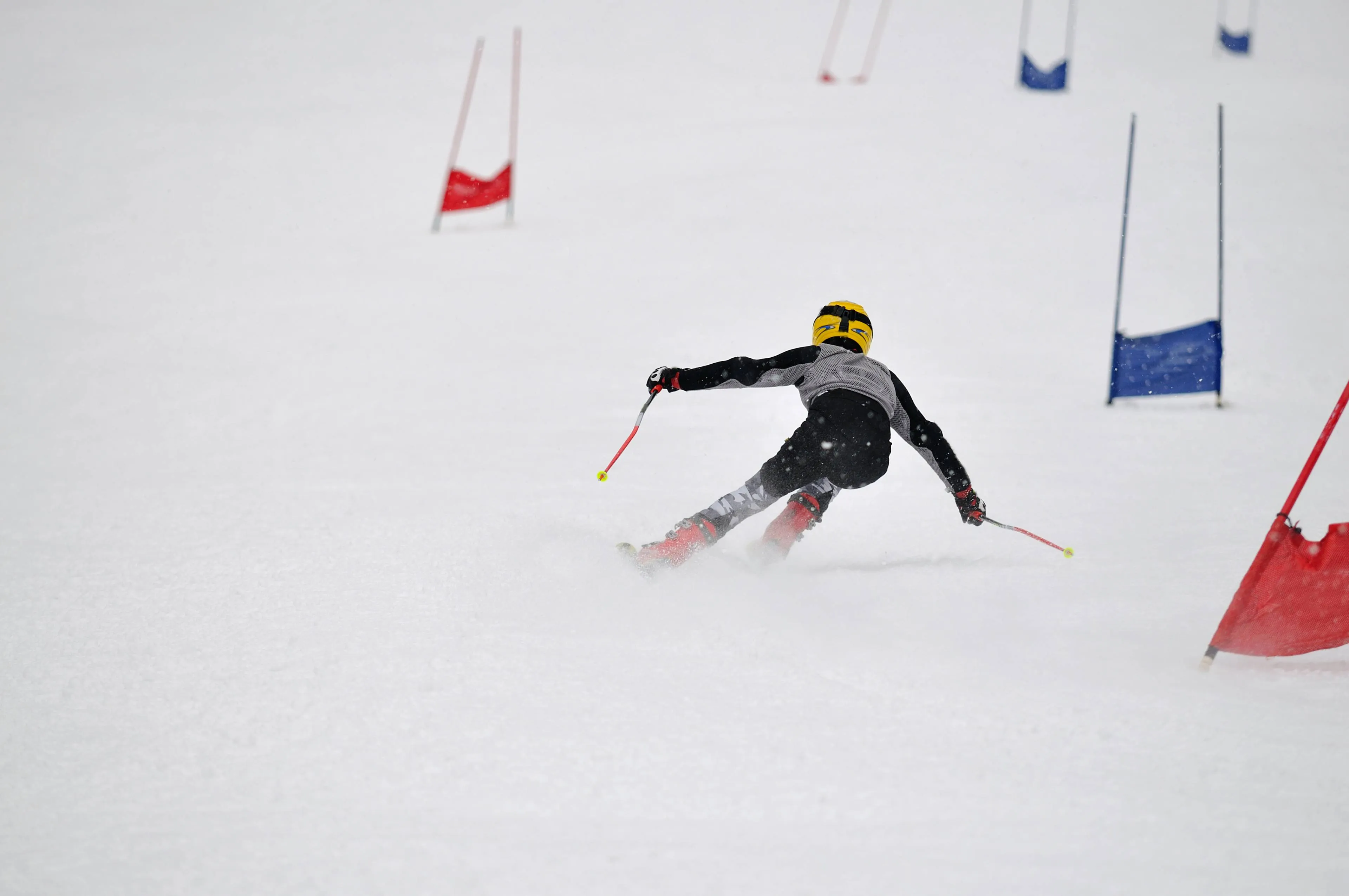 young-skier-race-fast-downhil-winter-snow-scene