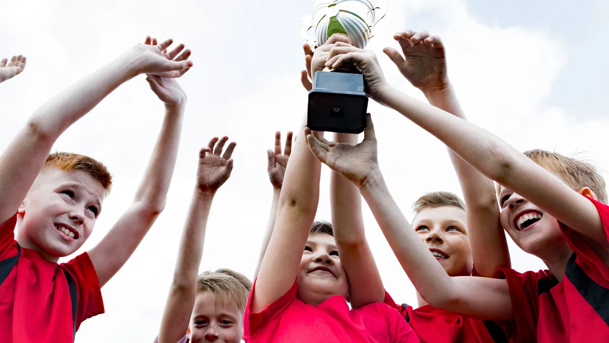 junior team holding trophy