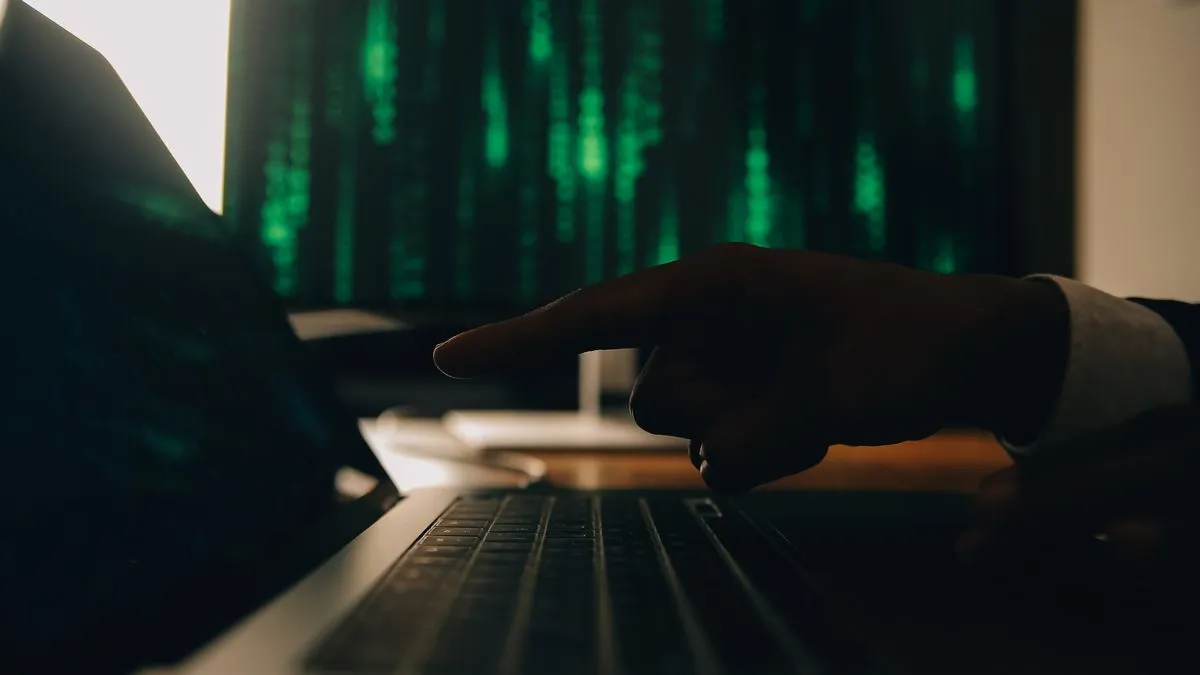 hacker code laptop cyber security privacy hack threat coder programmer writing virus software malware internet attack developing digital design green web data computer screen