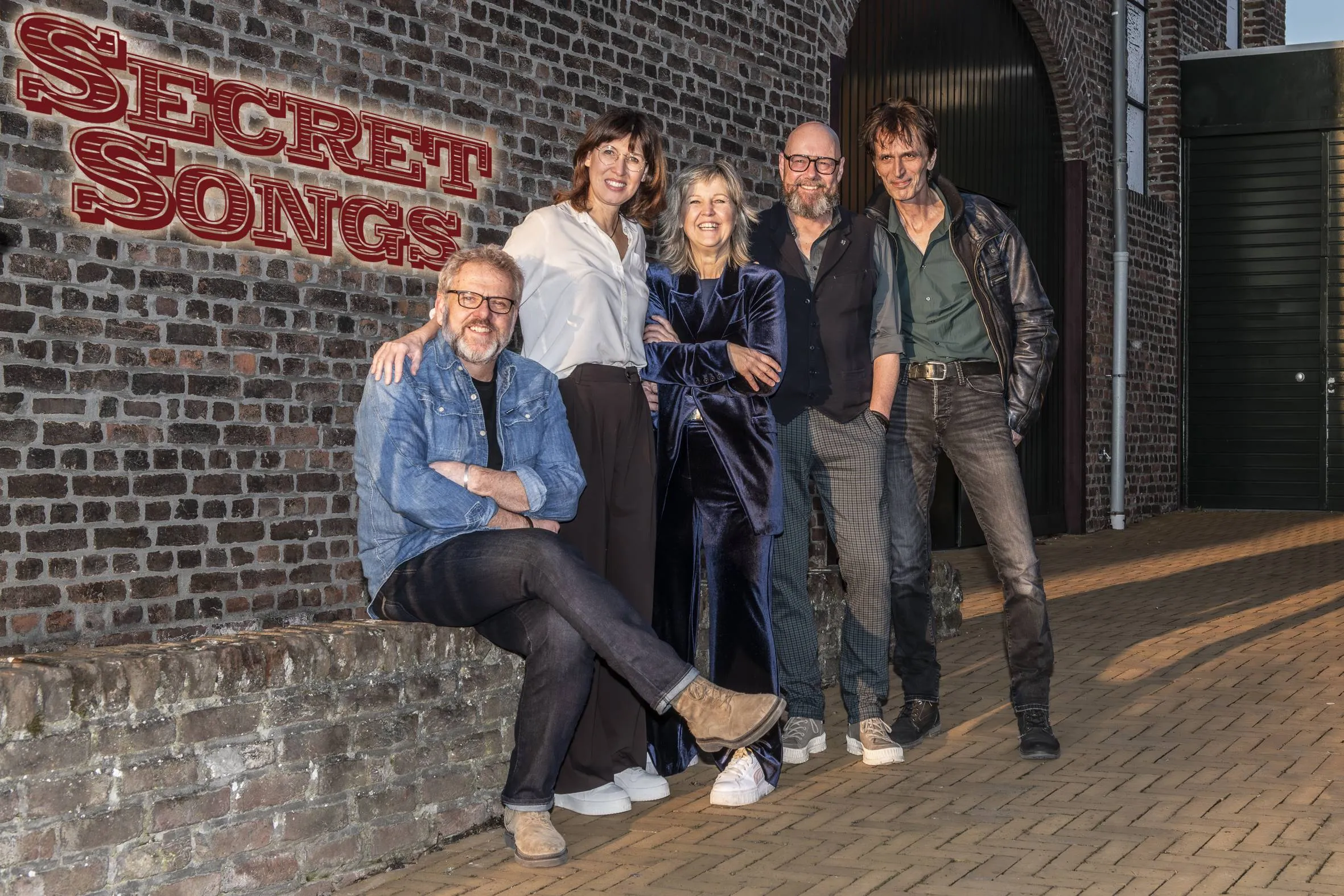 Secret Songs foto John Rutten met logo