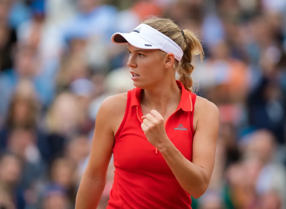 Fans undrer sig: Verdensetter klippet ud af billede med Caroline Wozniacki