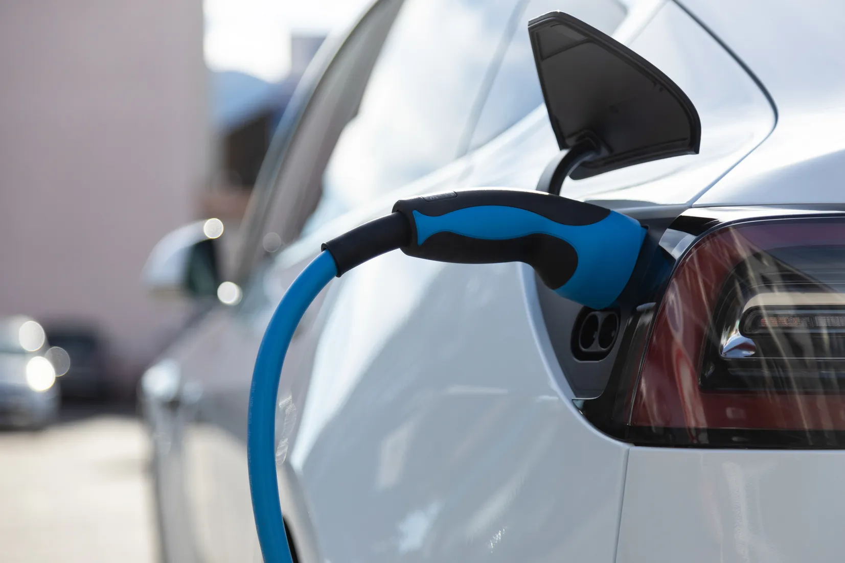ev electric car pluged charging at a recharge stat lye49g9 25