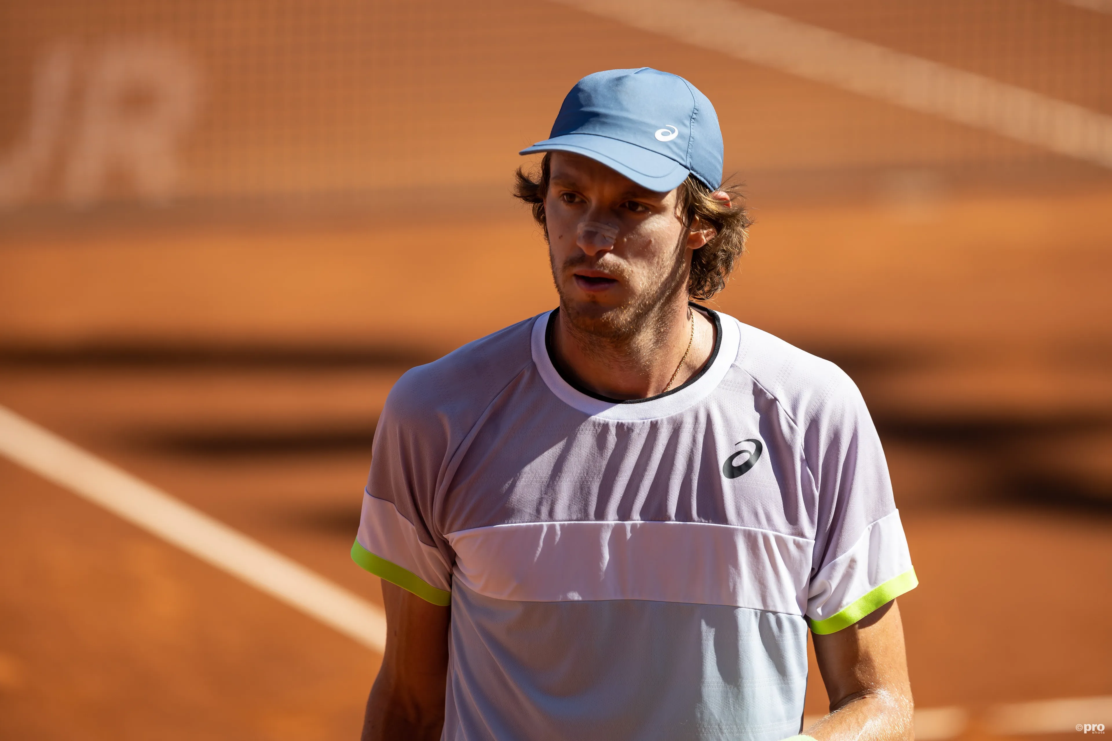 Nicolas Jarry waiting for a ball to serve