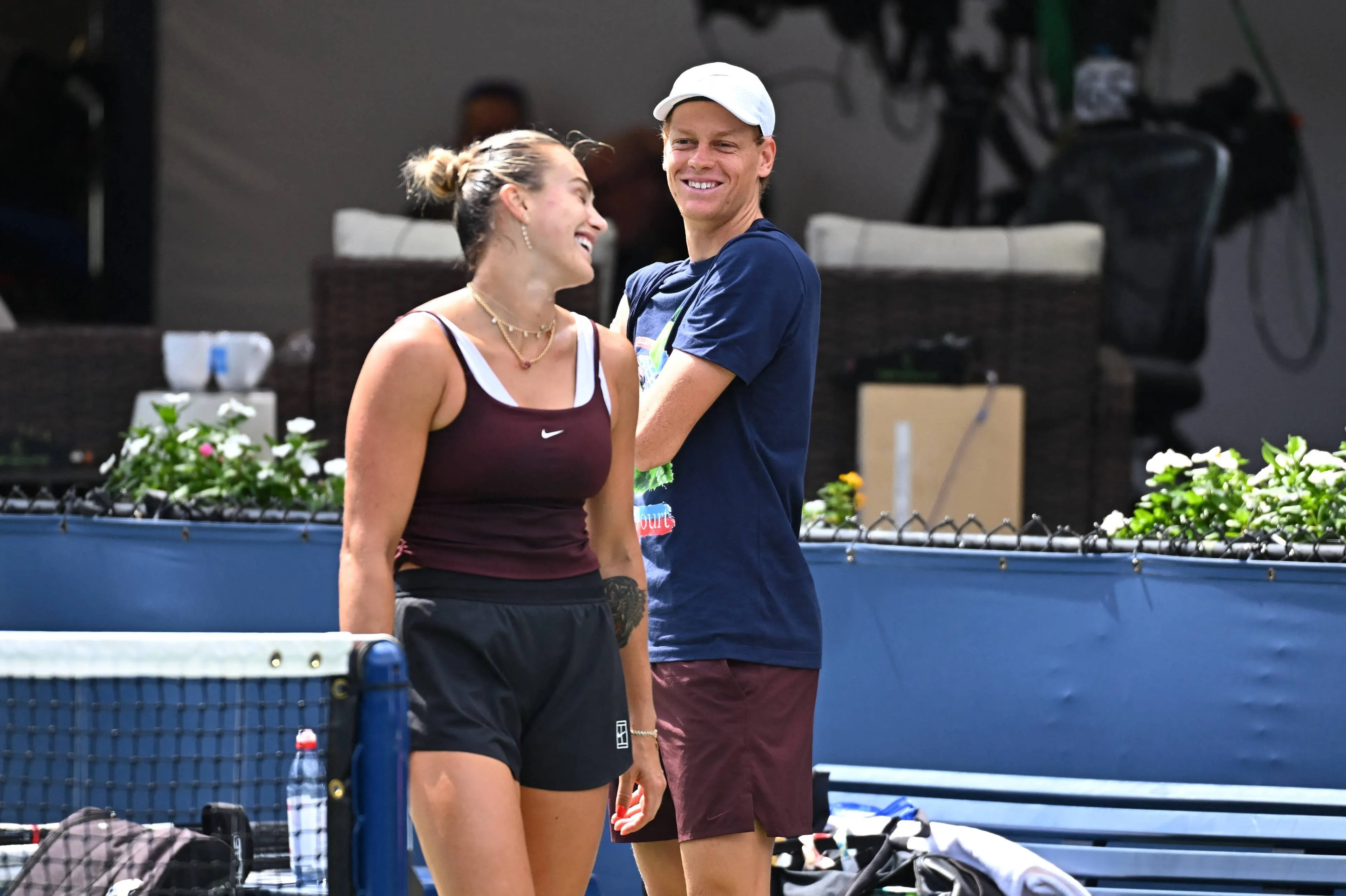Sinner and Sabalneka smile each other during practice in US Open