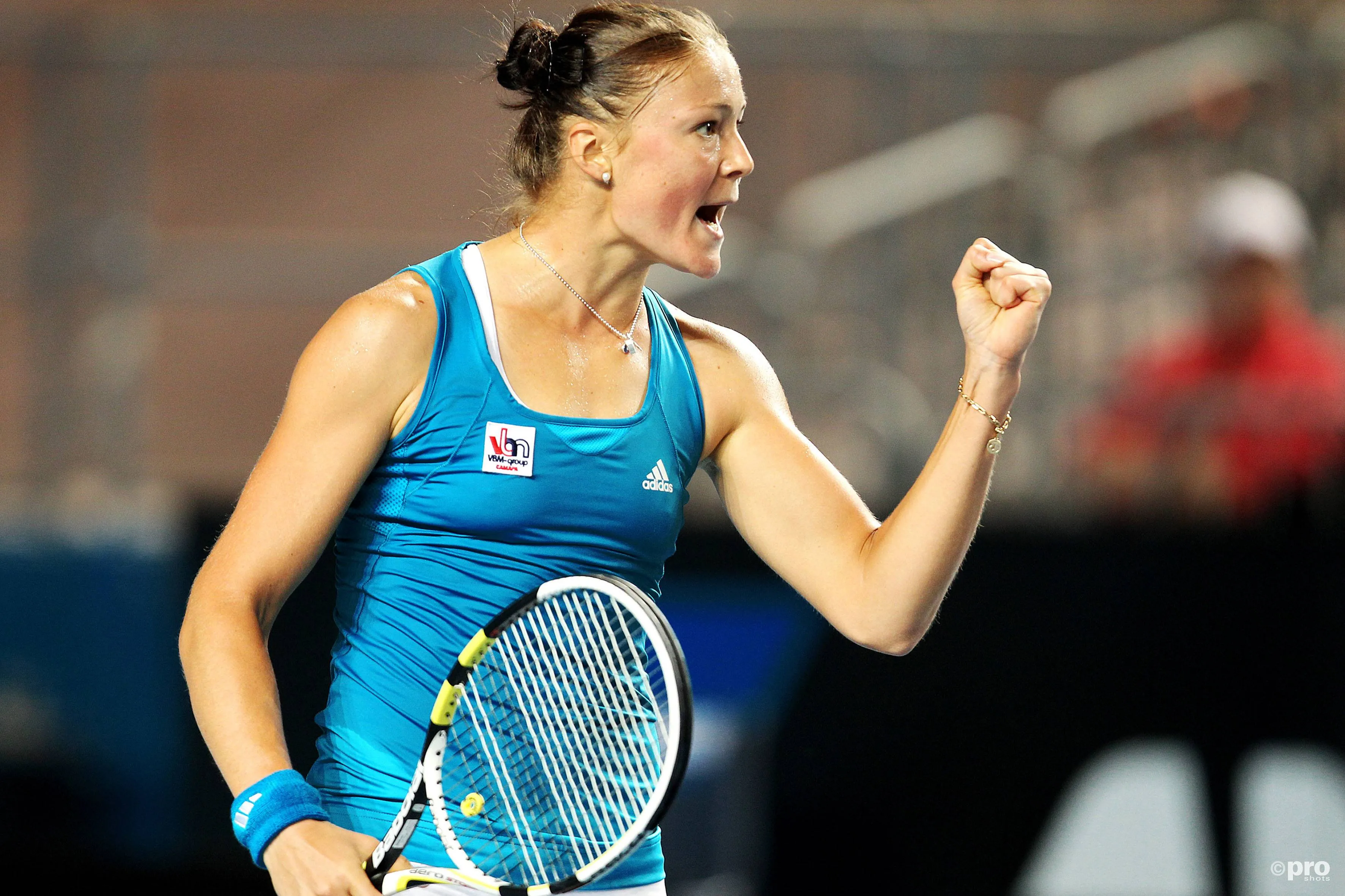 Dinara Safina raises a fist.